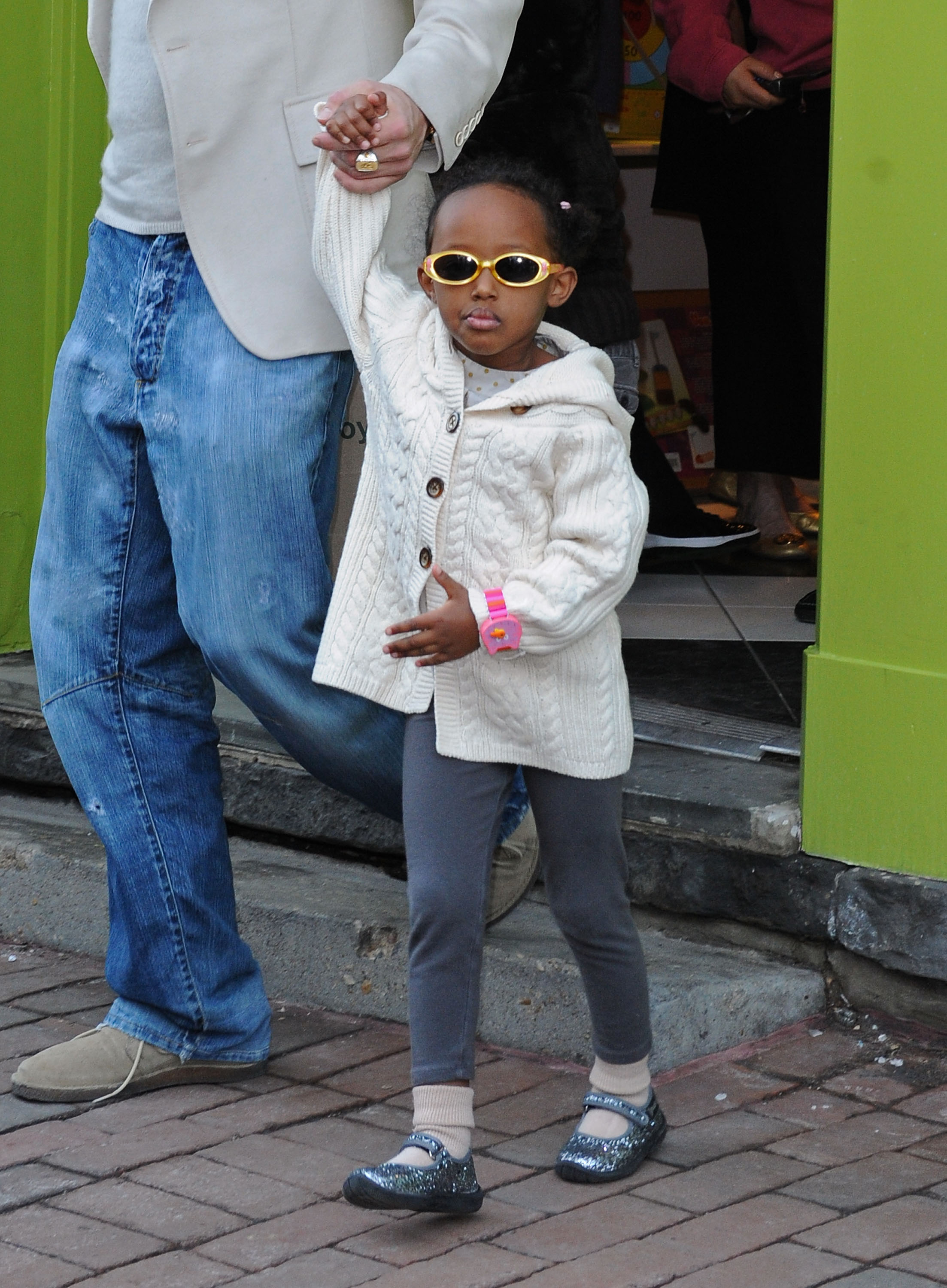 Brad Pitt and Zahara Jolie-Pitt seen leaving Tugooh toy store in Washington, DC on March 6, 2009. | Source: Getty Images