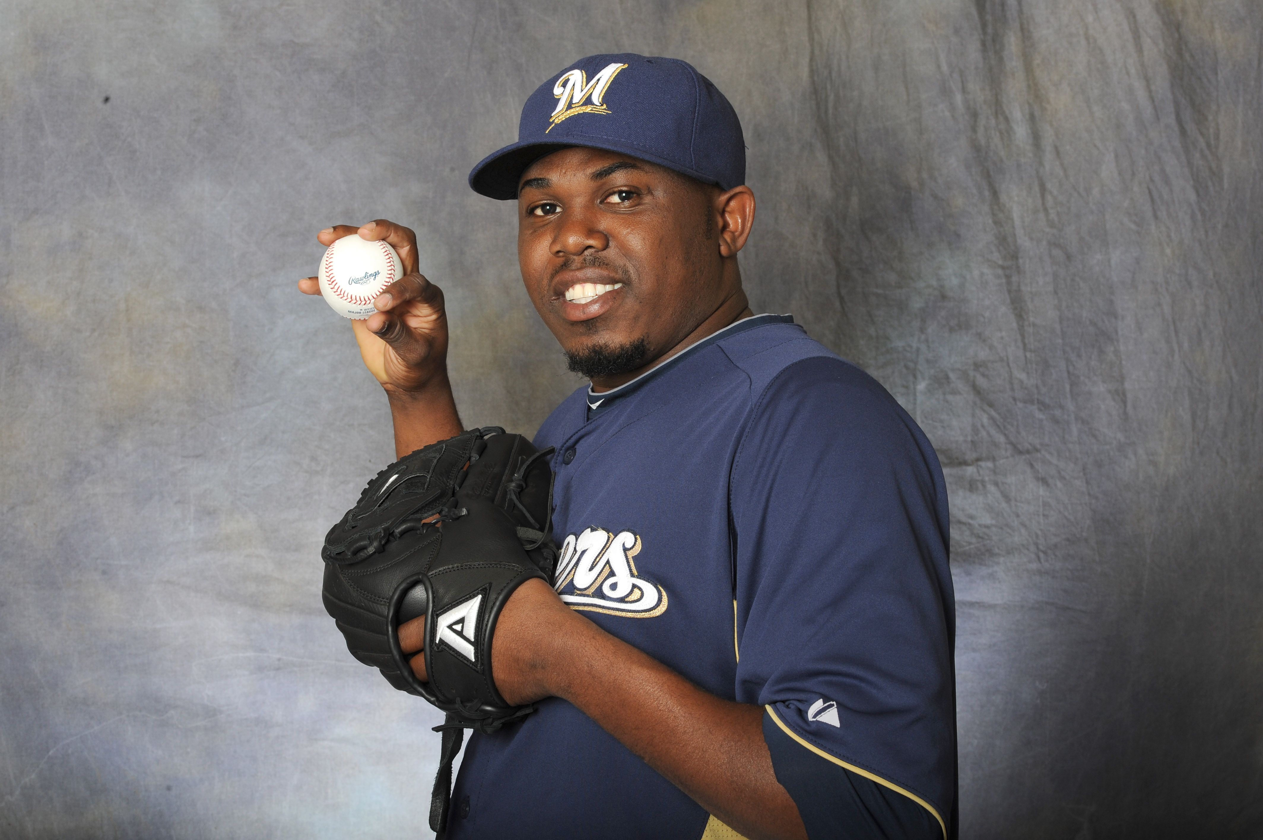 Frankie De La Cruz #63 of the Milwaukee Brewers posed for a portrait at a photo day at Maryvale Baseball Park on February 26, 2012 | Photo: Getty Images