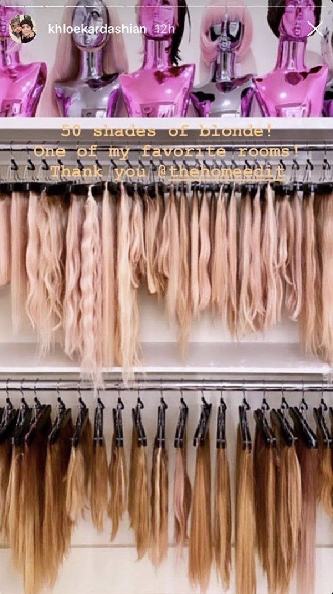 Khloé Kardashian's  hair extensions in different colours hung in a closet. |Photo:Instagram/KhloéKardashian 