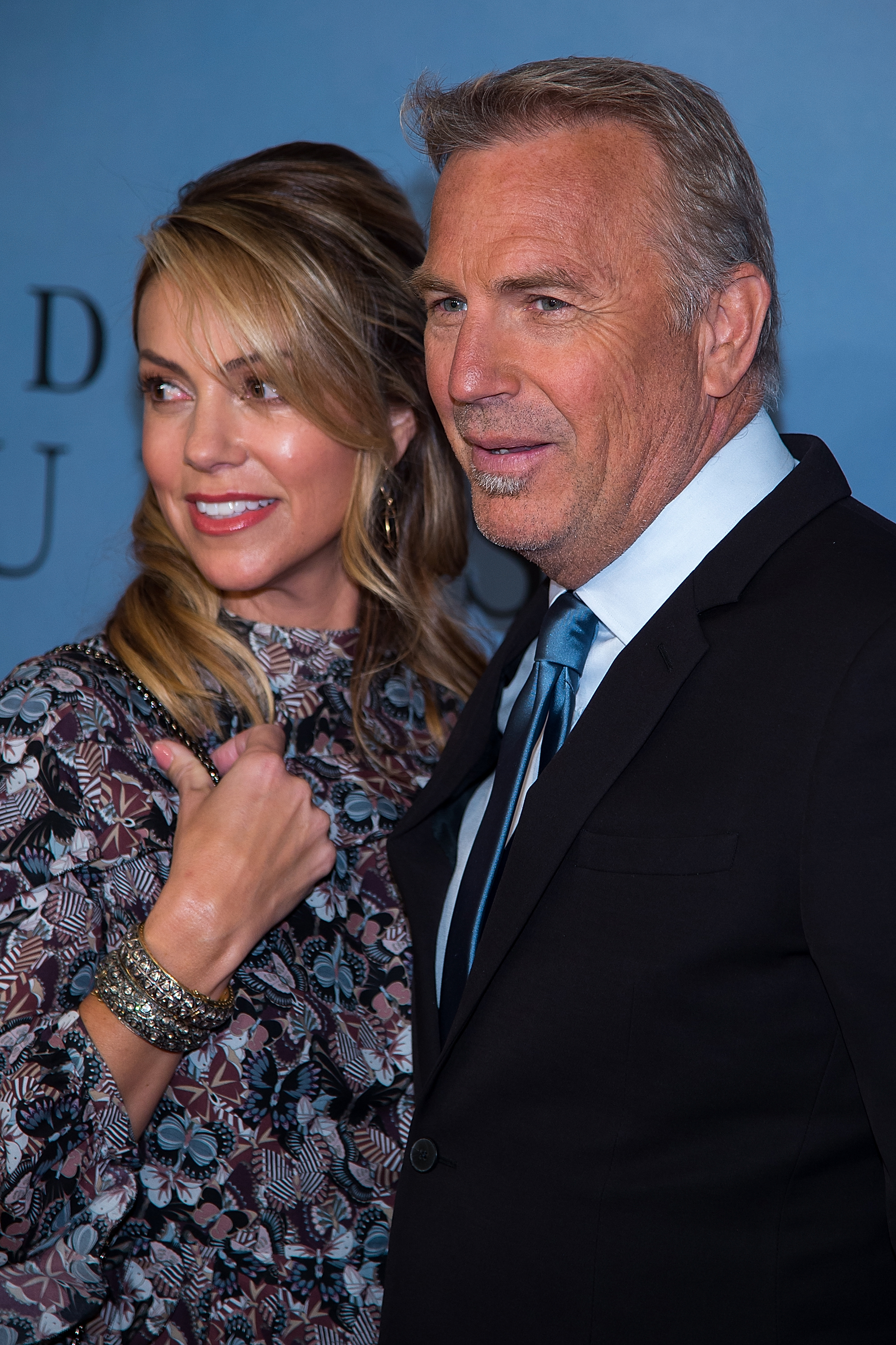 Christine Baumgartner and Kevin Costner at the "Hidden Figures" New York special screening on December 10, 2016, in New York City | Source: Getty Images