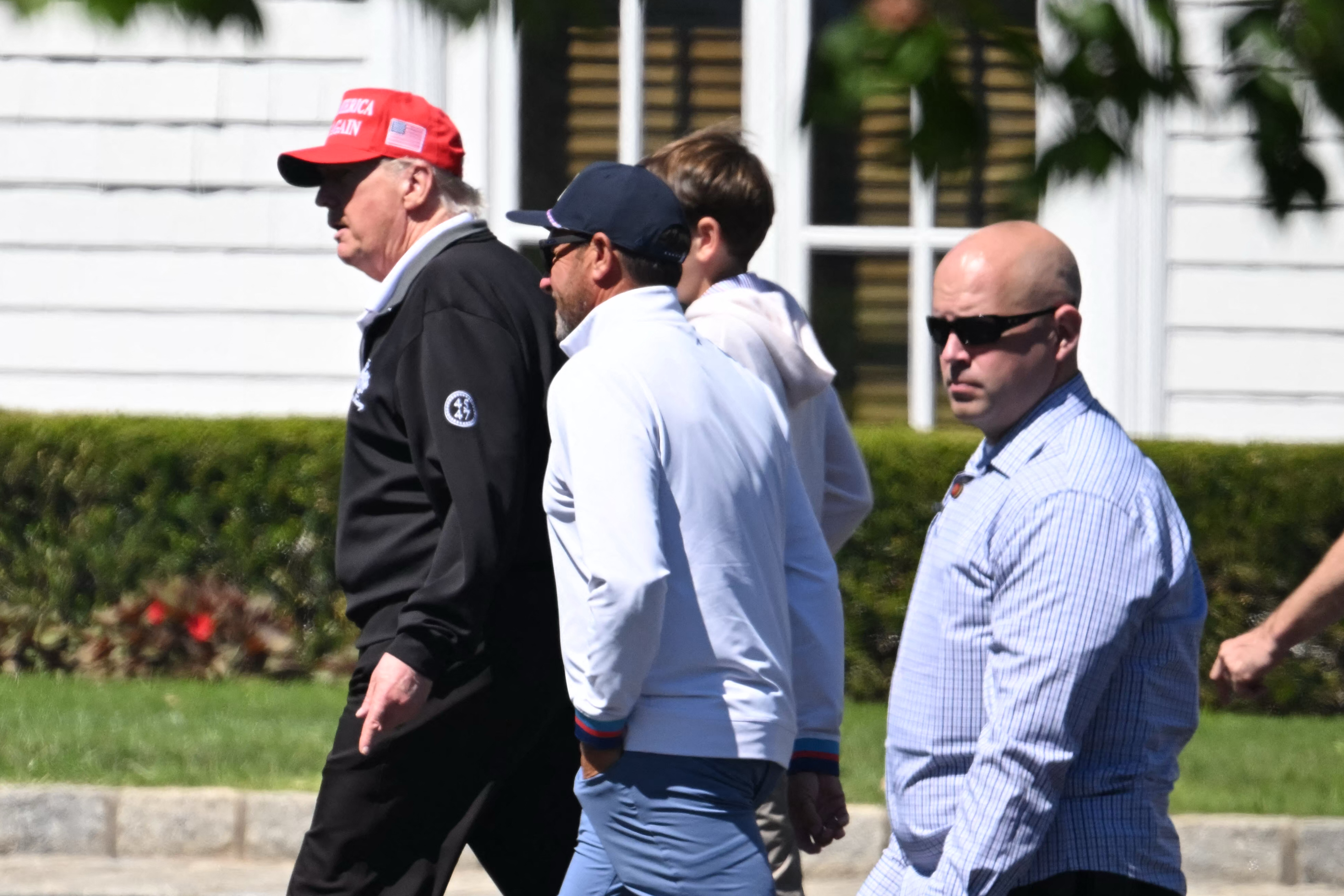 Donald and Spencer Frederick Trump at Trump National golf course in Sterling, Virginia, on August 30, 2025. | Source: Getty Images