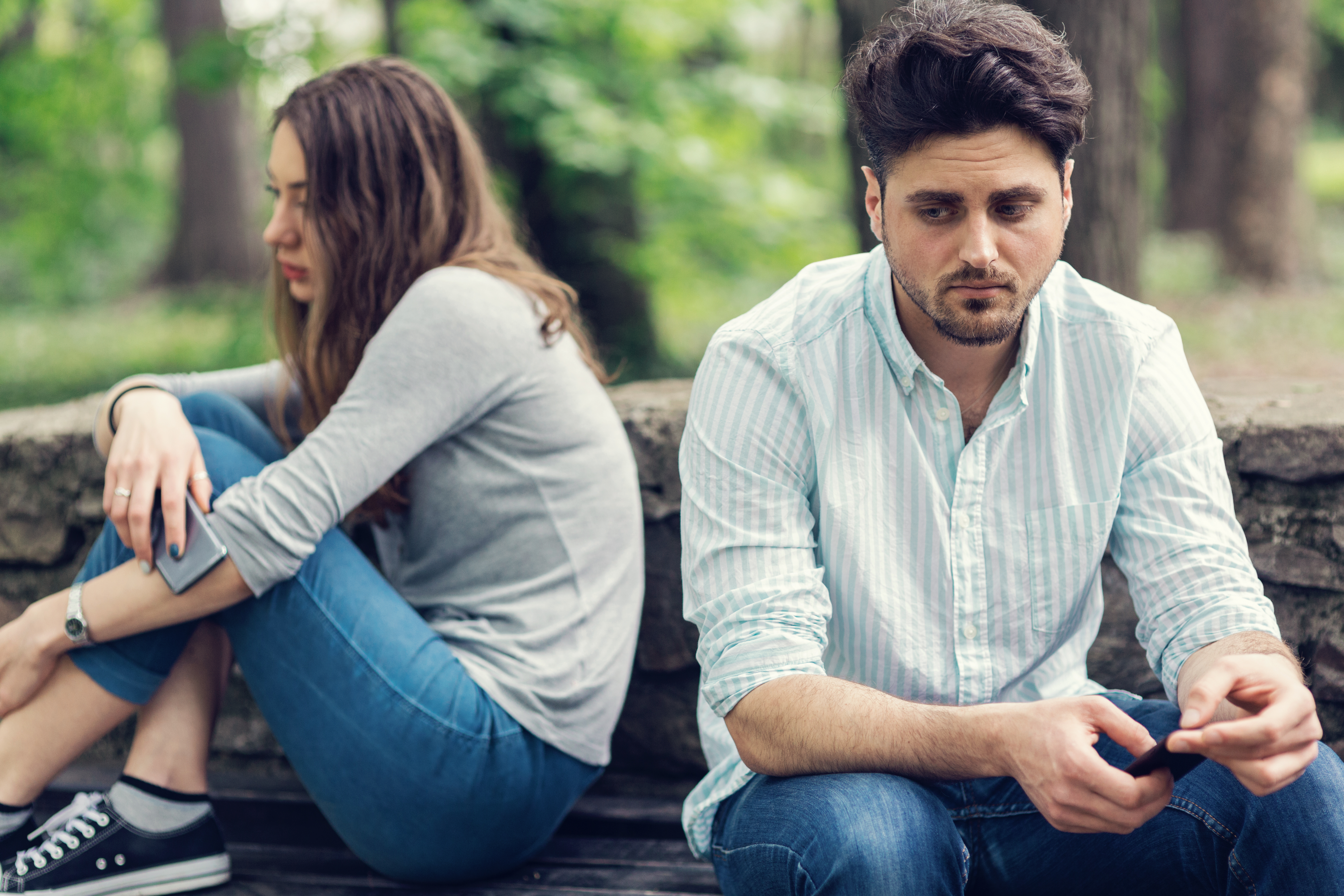 Young couple in relationship difficulties staying away from each other | Source: Getty Images