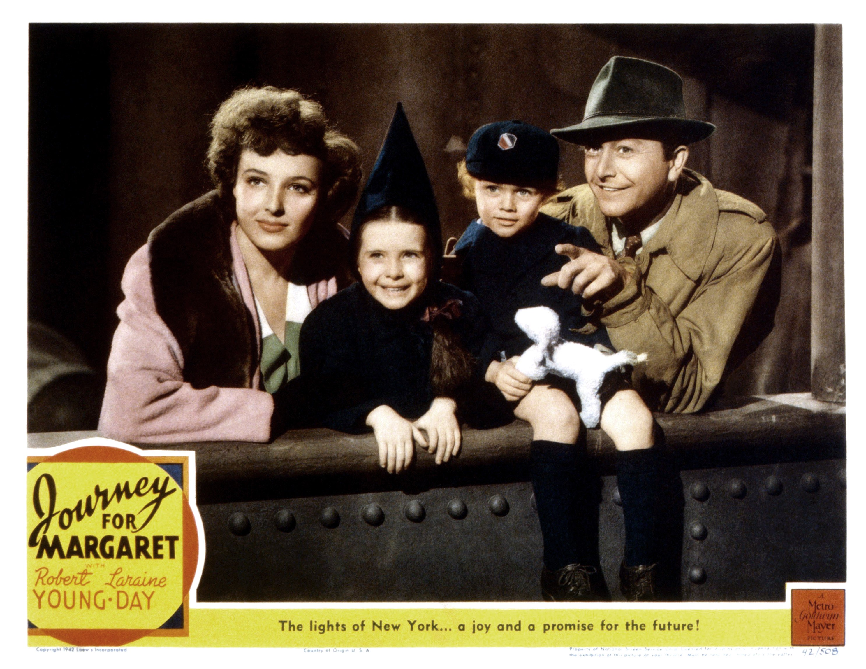 (L-R) Laraine Day, the child actress, William Severn, and Robert Young on the set of "Journey for Margaret," 1942 | Source: Getty Images