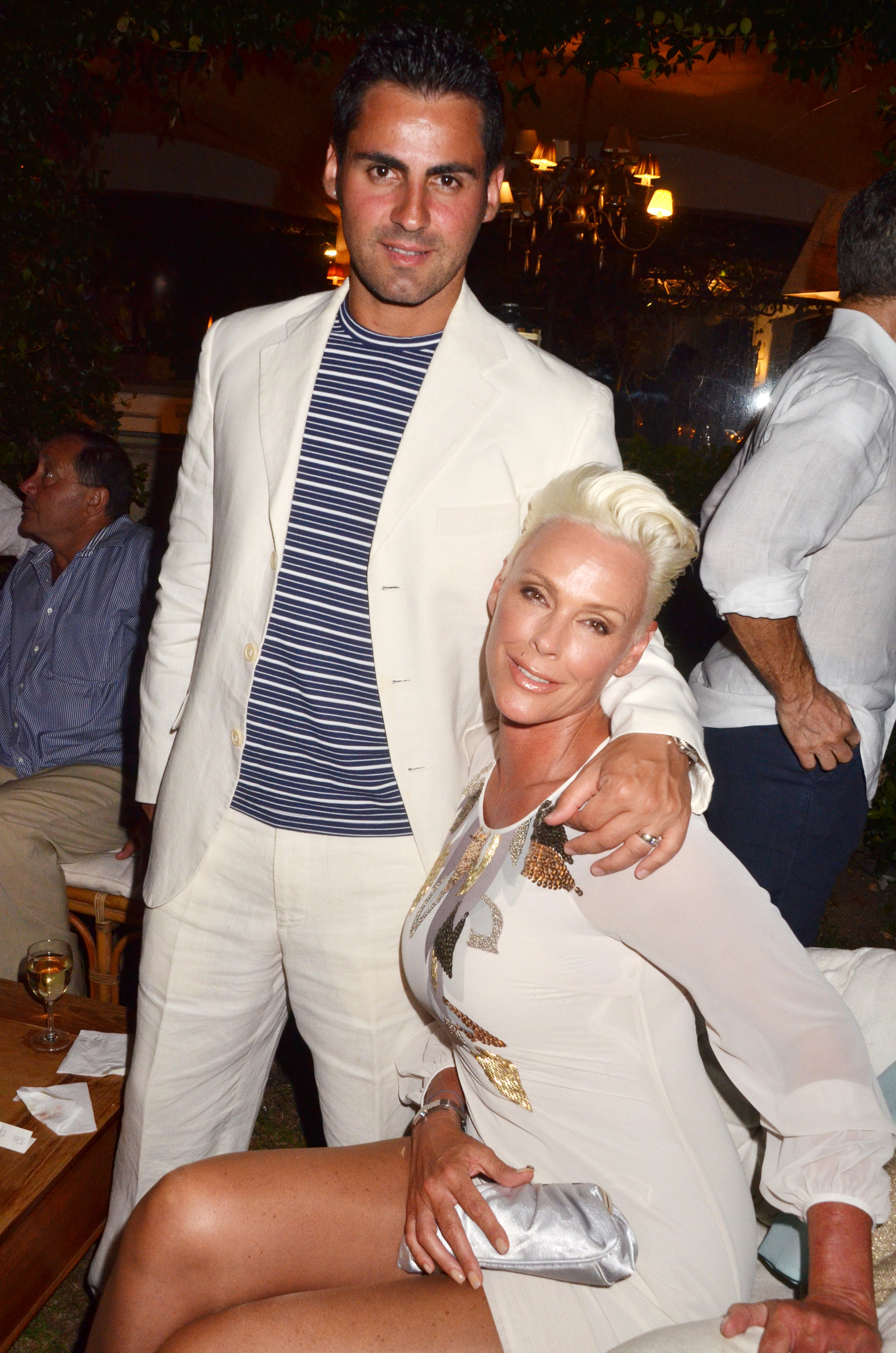 Mattia Dessi and Brigitte Nielsen at the Massimo Gargia Summer Party in France, 2011 | Source: Getty Images