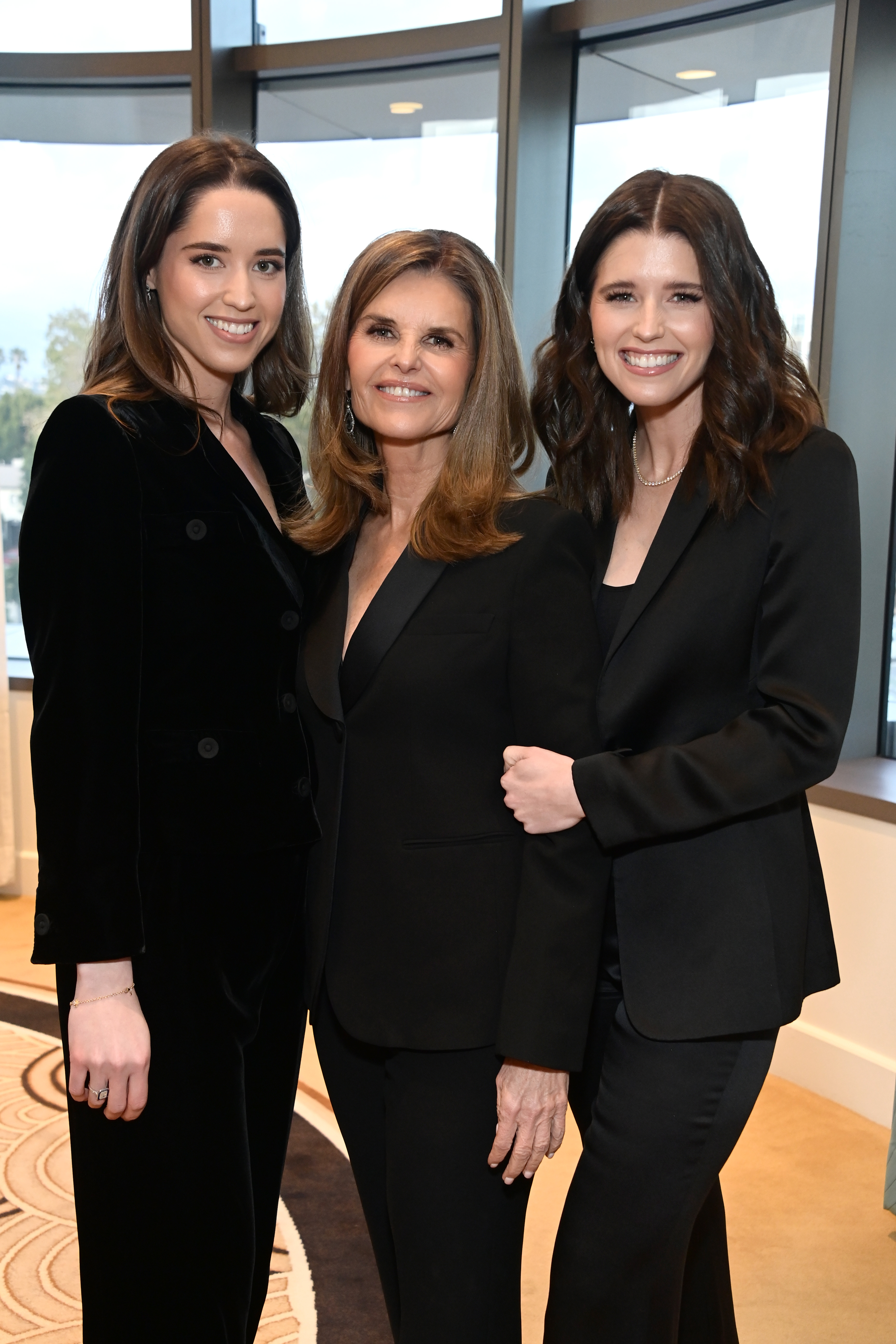 Christina Schwarzenegger, Maria Shriver, and Katherine Schwarzenegger at the International Women's Day Celebration on March 6, 2023, in Los Angeles, California | Source: Getty Images
