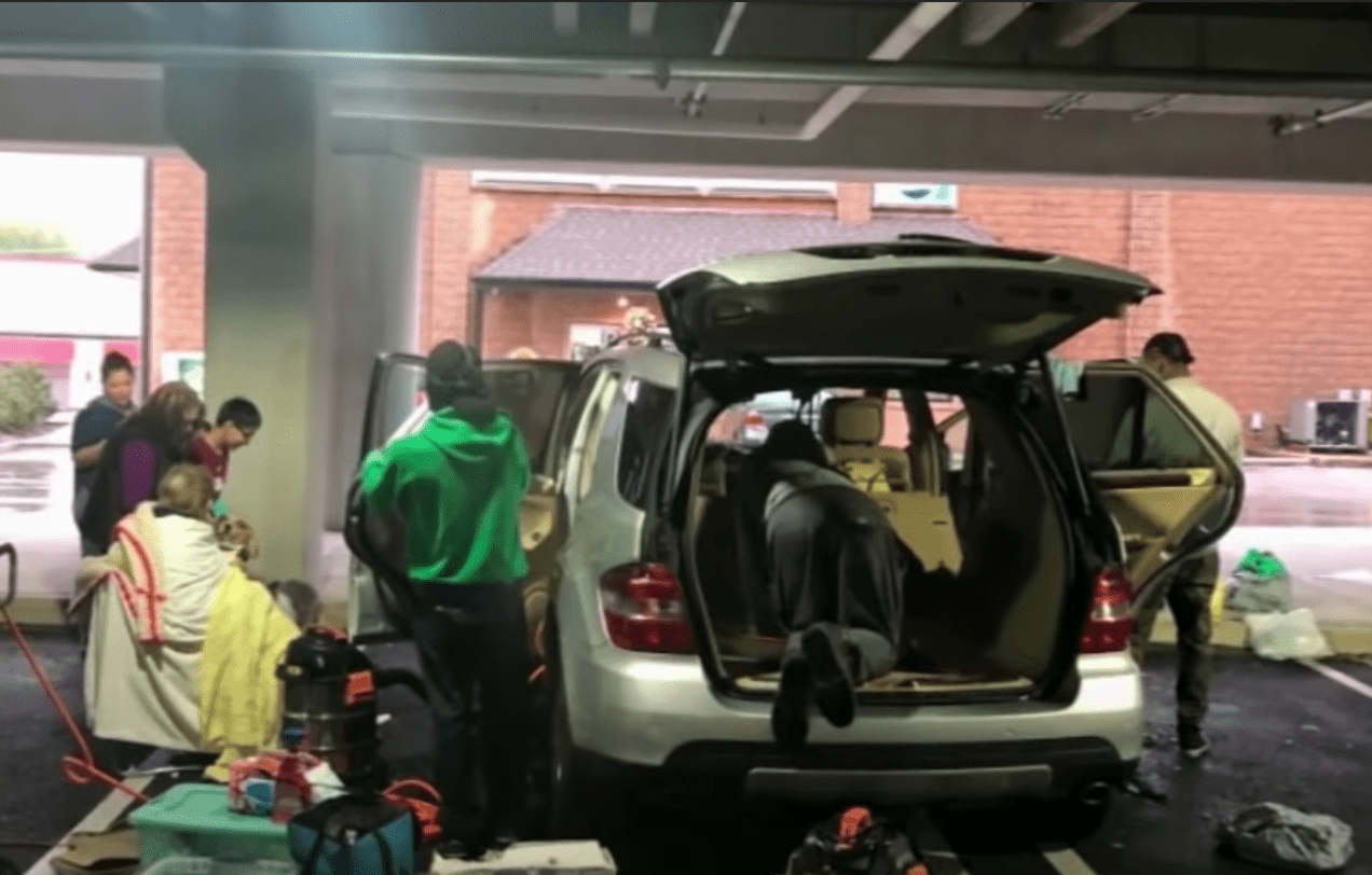 The car Schutzman lived in is being cleaned by volunteers | Photo: youtube.com/ABC News