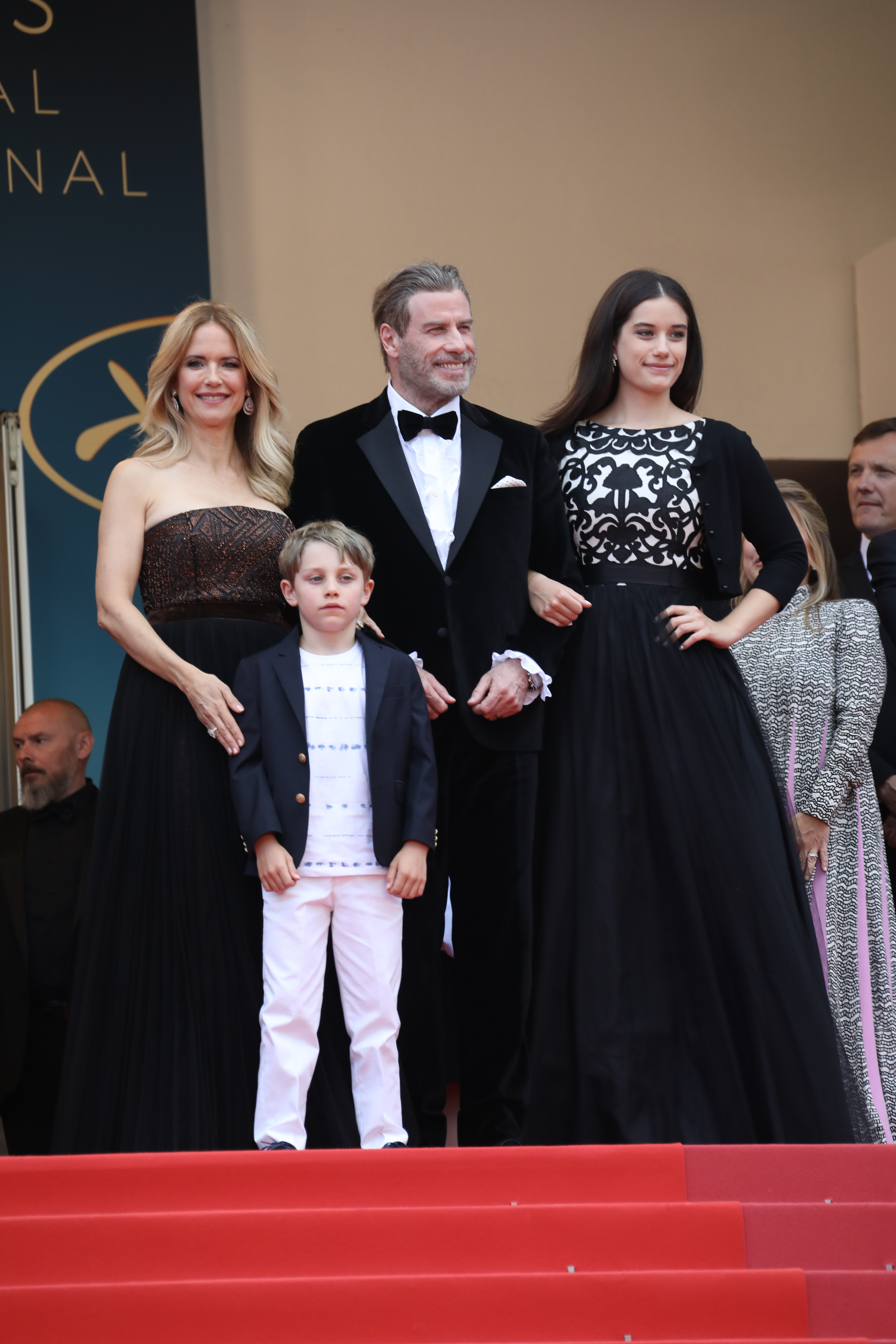 Kelly Preston, John Travolta, Ella Bleu Travolta, and Benjamin Travolta pose on the Cannes red carpet in 2018. The family attended a screening of "Solo: A Star Wars Story" during the annual film festival in France.
