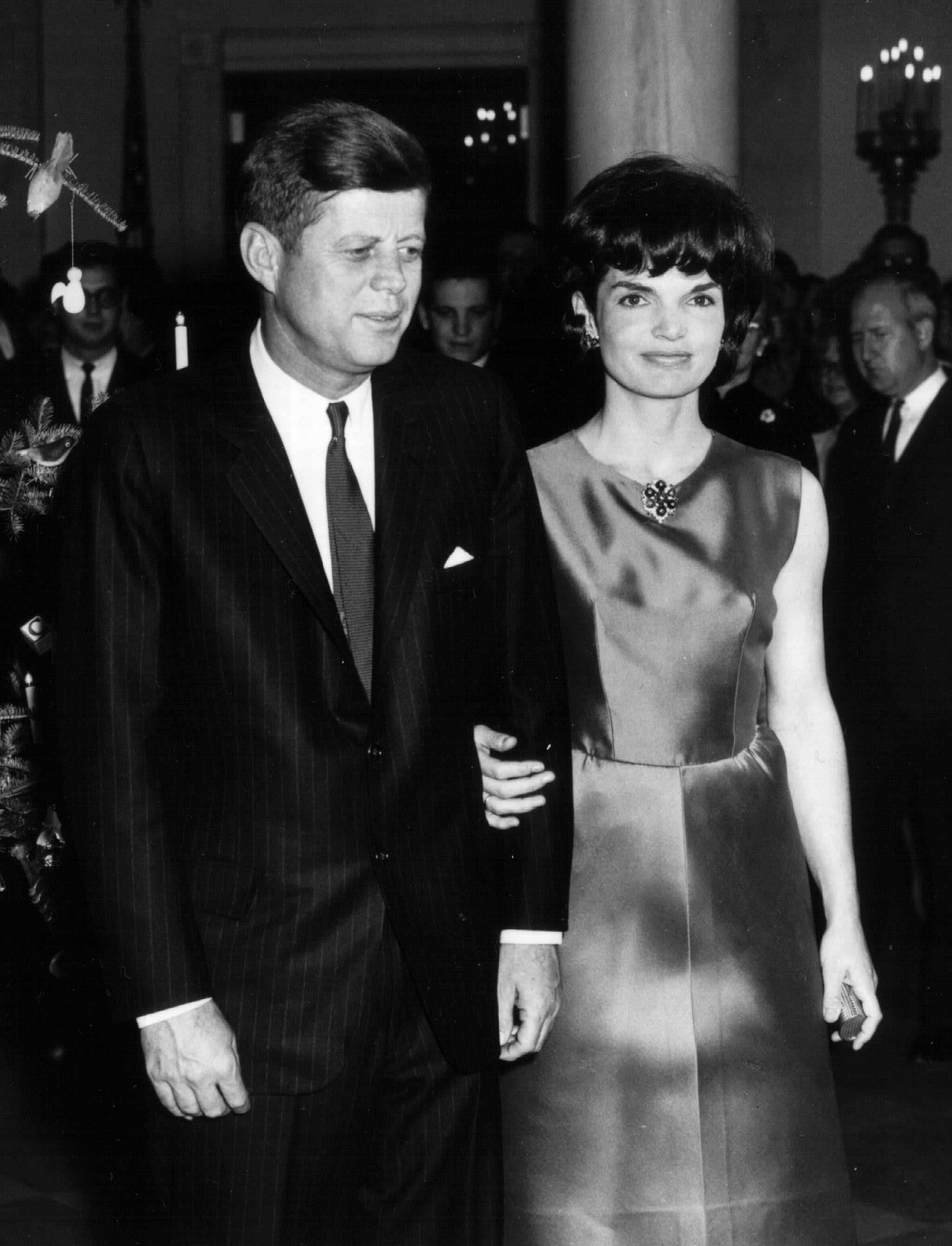 President John F. Kennedy and First Lady Jacqueline Kennedy at a White House ceremony in December 1962 | Source: Getty Images