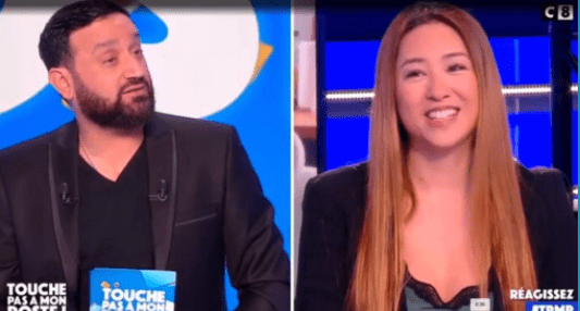 Capture d'écran de Cyril Hanouna et Marjolaine Bui | Photo : Twitter/TPMP
