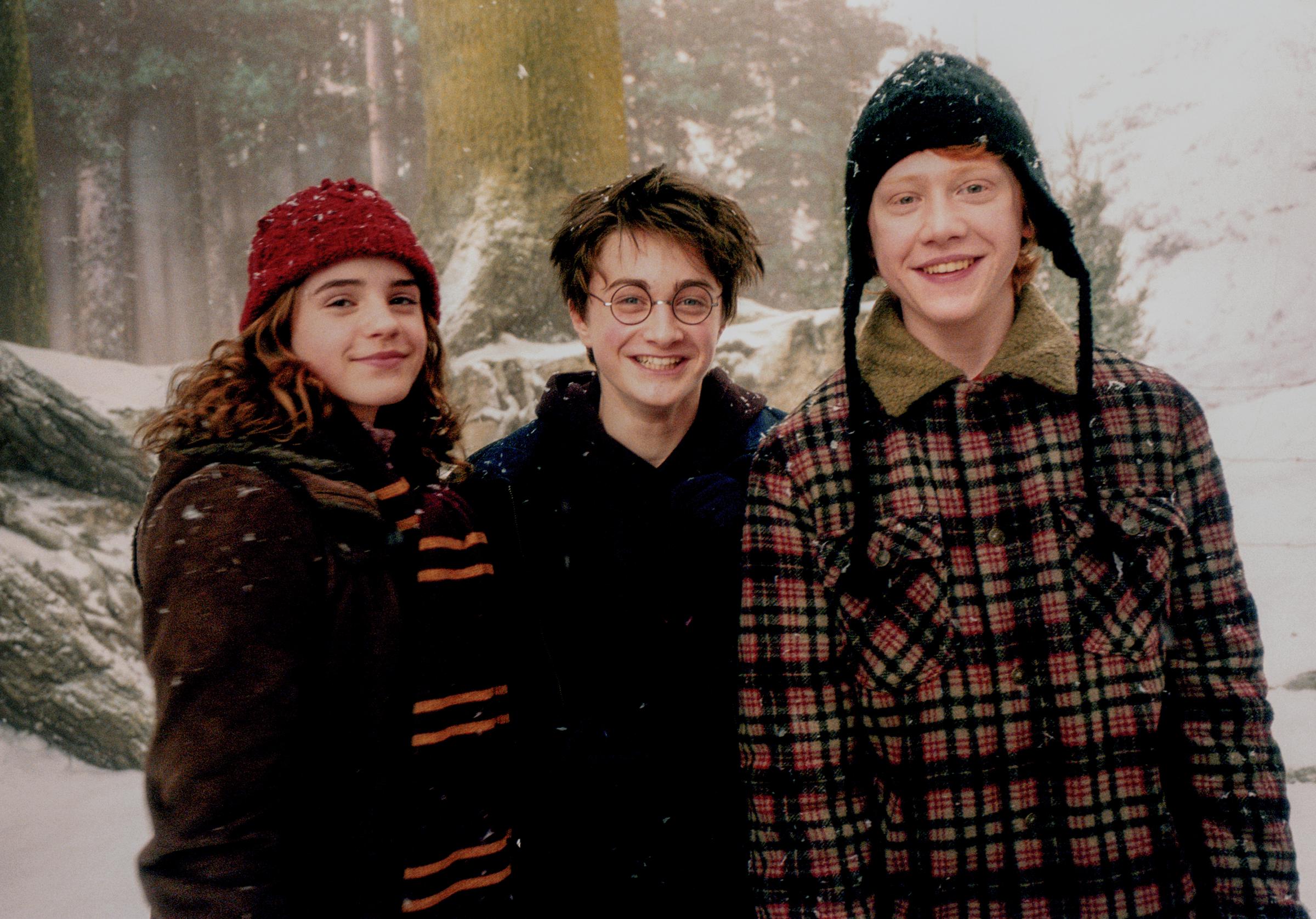 Emma Watson, Daniel Radcliffe, and Rupert Grint on the set of "Harry Potter and the Prisoner of Azkaban," in London, England, in 2003 | Source: Getty Images