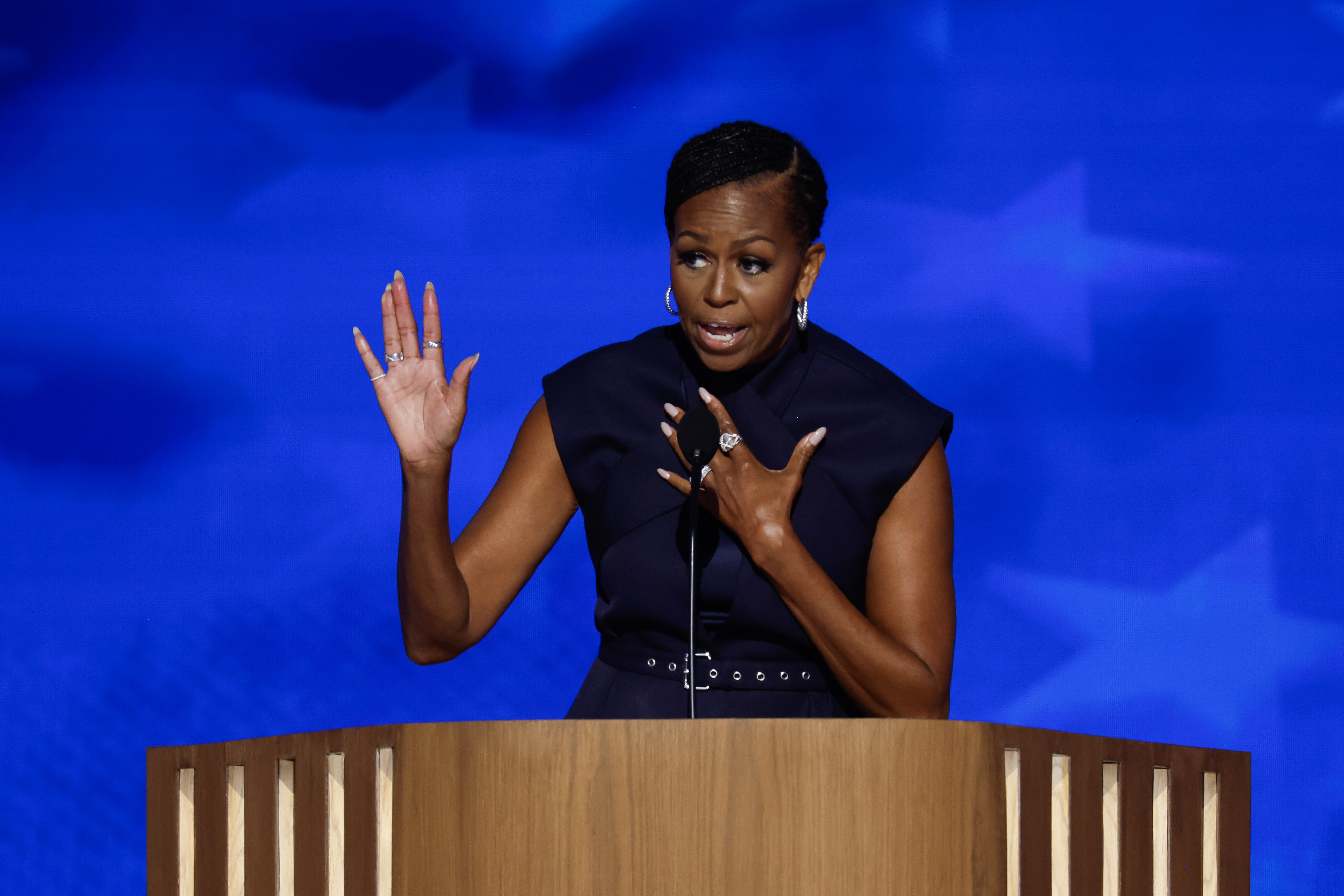 Michelle Obama speaks on stage during the second day of the Democratic National Convention on August 20, 2024, in Chicago, Illinois. | Source: Getty Images