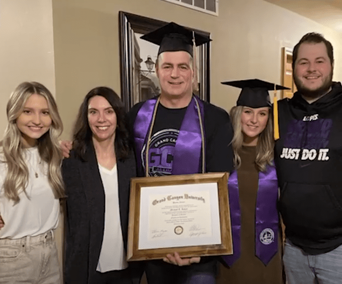 Mike Loven (center) celebrated his graduation from GCU with (from left) daughter-in-law Annie, wife Carrie, daughter Taleigh and son Austin. | Source: Facebook/Good Morning America