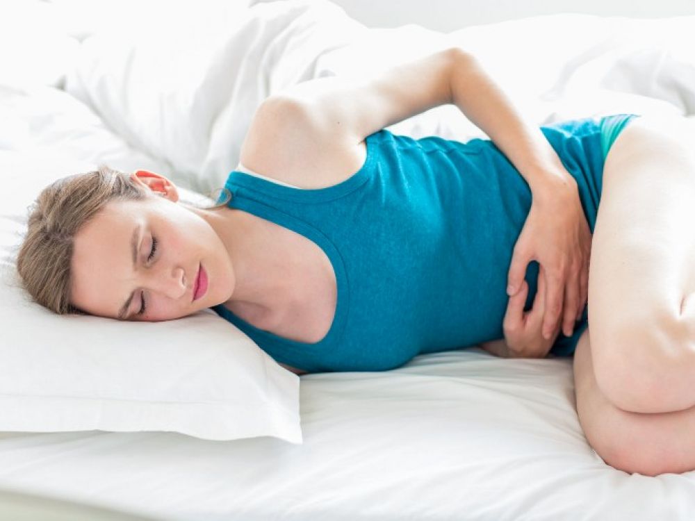 Image d'une Femme souffrante de douleurs dues à L'Endométriose | Photo : Getty Images