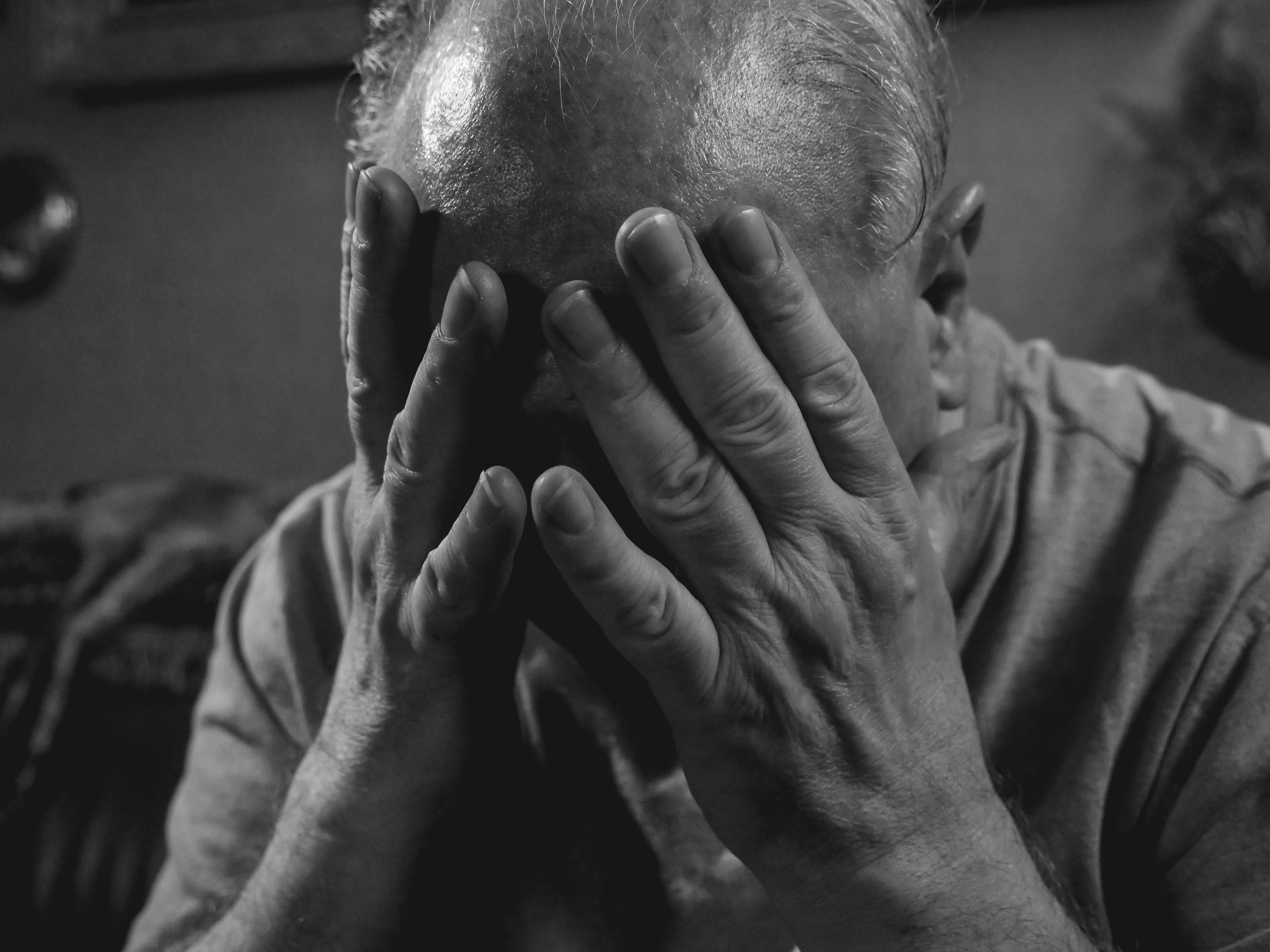 Grayscale image of a sad man | Source: Pexels