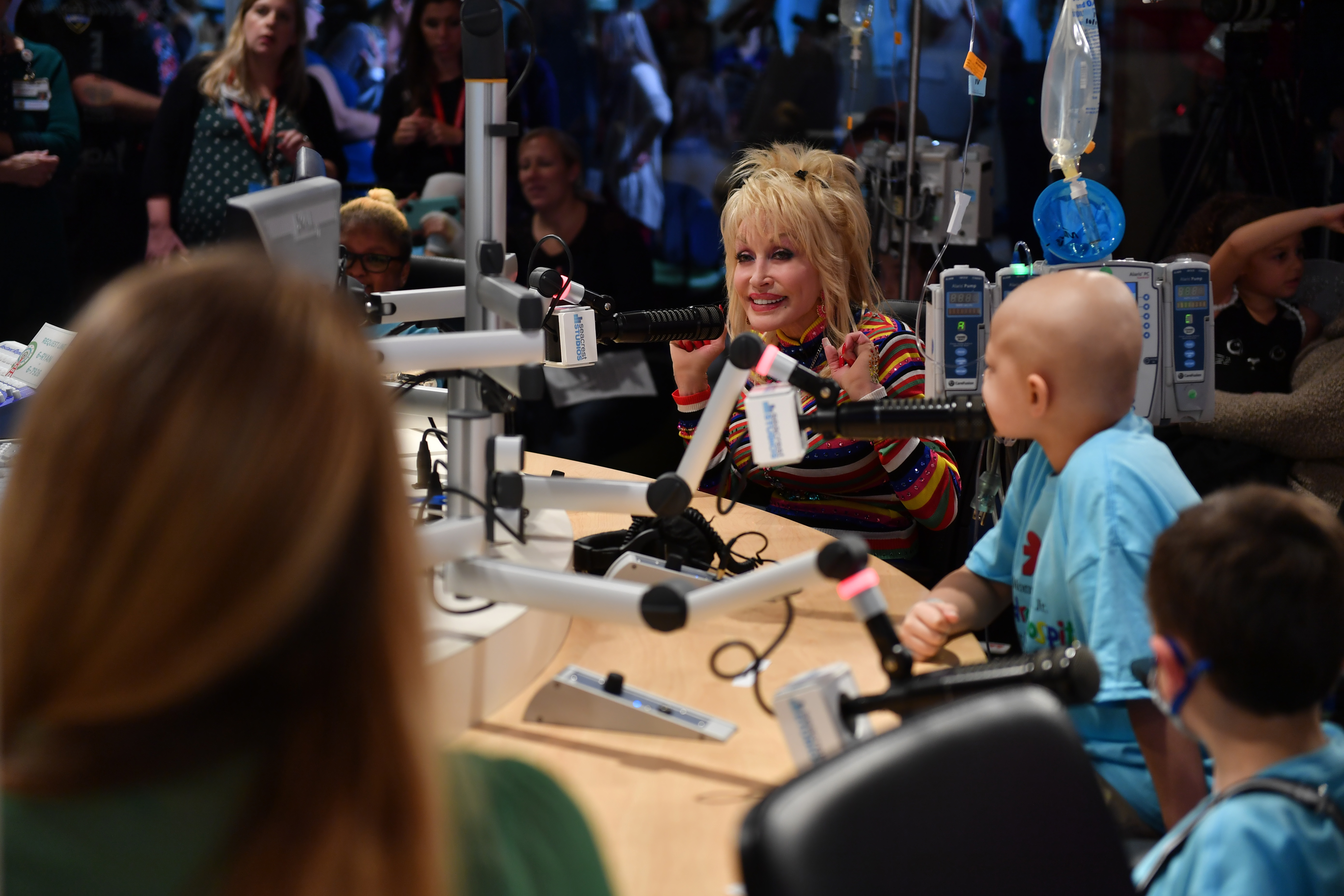 Dolly Parton visits Monroe Carell Jr. Children's Hospital at Vanderbilt to share her music and her own family's story of hope with kids and their parents in Nashville, Tennessee, on October 13, 2017. | Source: Getty Images
