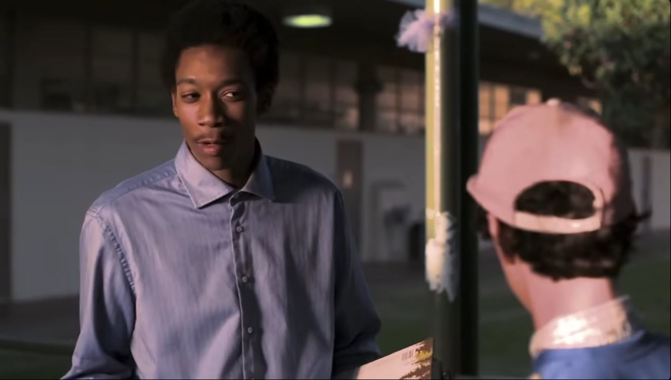 Devin Overstreet, played by Wiz Khalifa, begins an unlikely friendship that changes his high school experience in "Mac & Devin Go to High School." | Source: YouTube/SnoopDoggTV