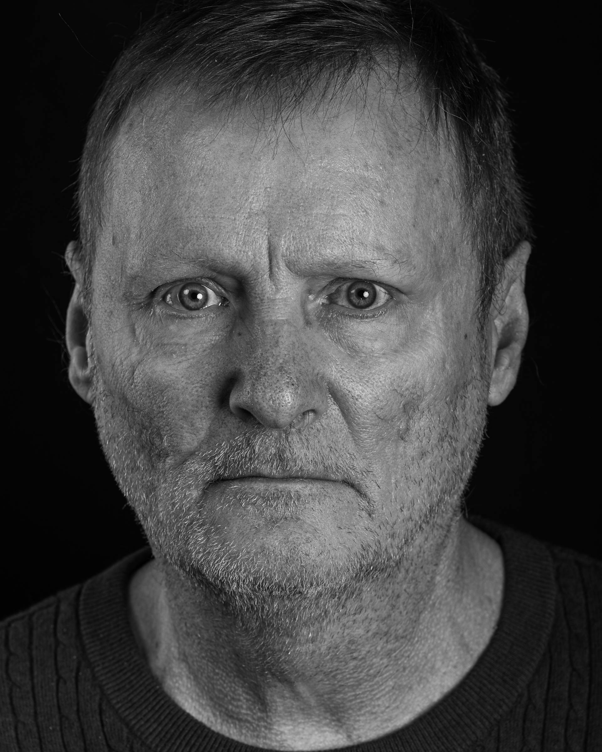 A grayscale shot of an angry man | Source: Pexels