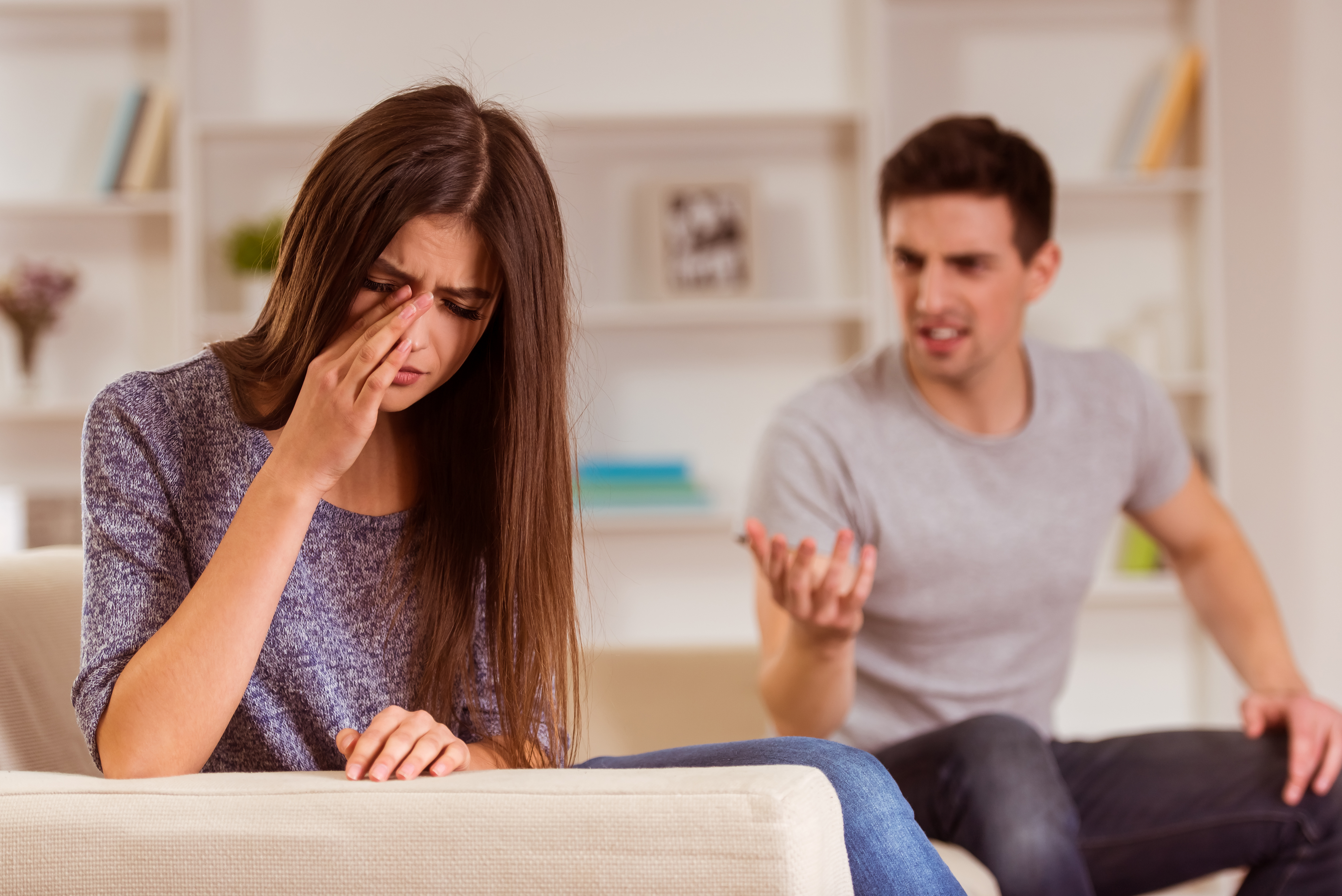 A woman crying during an argument with her husband | Source: Shutterstock