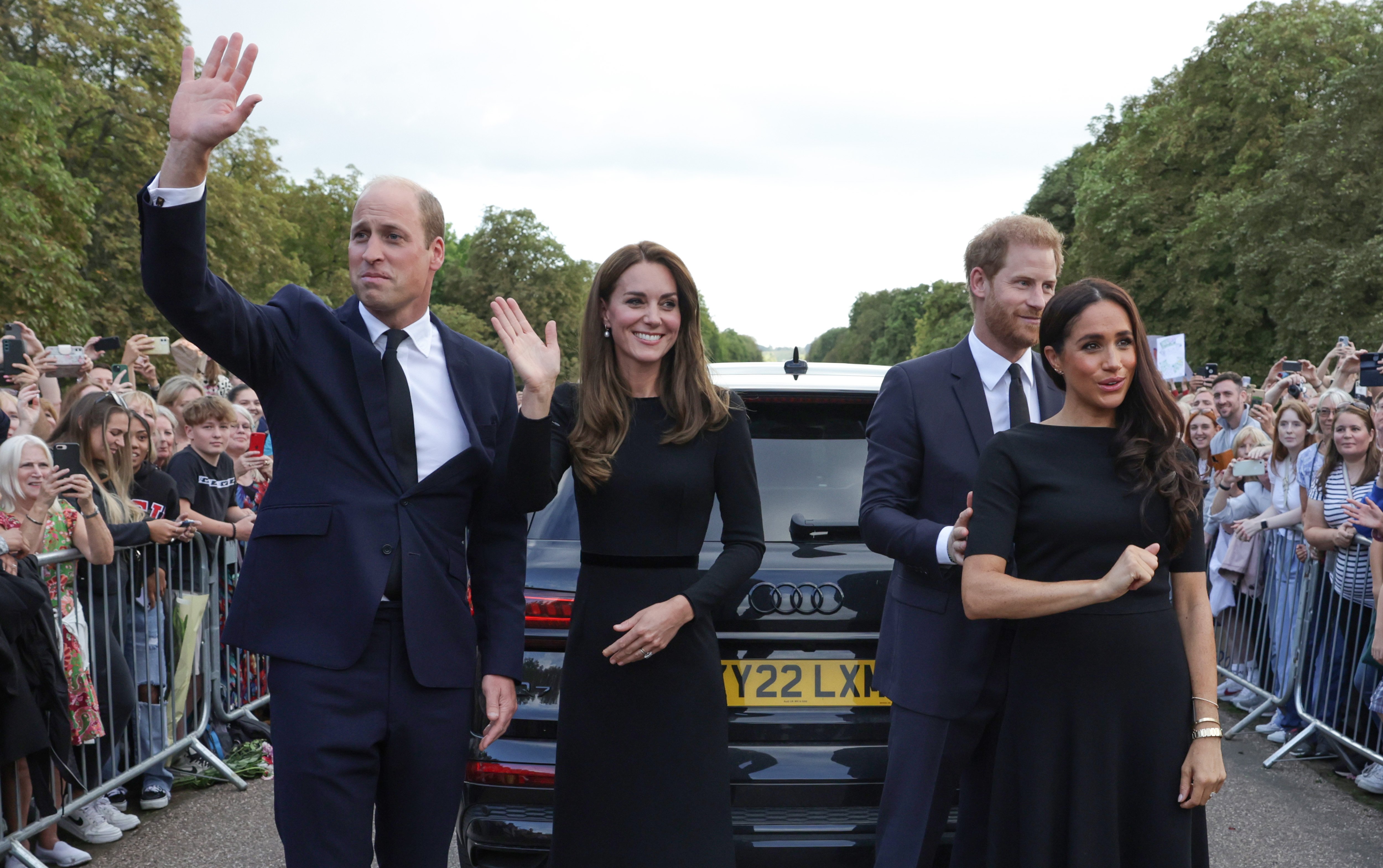 Catherine, Princess of Wales, Prince William, Prince of Wales, Prince Harry, Duke of Sussex, and Meghan, Duchess of Sussex wave to crowd on the long Walk at Windsor Castle on September 10, 2022 in Windsor, England | Source: Getty Images 