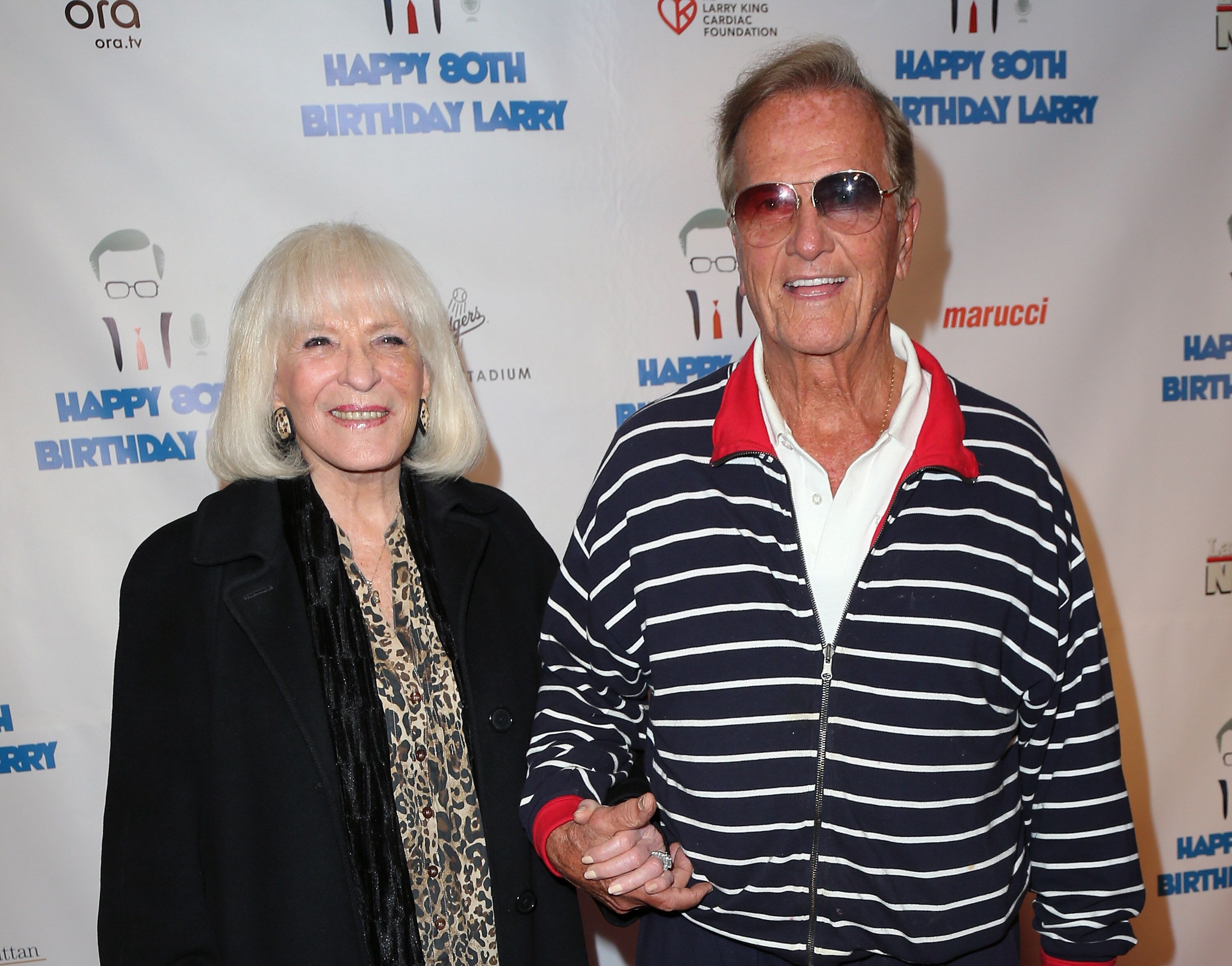 Pat Boone and wife Shirley Boone at Larry King's 80th birthday surprise party in Los Angeles in 2013 | Source: Getty Images