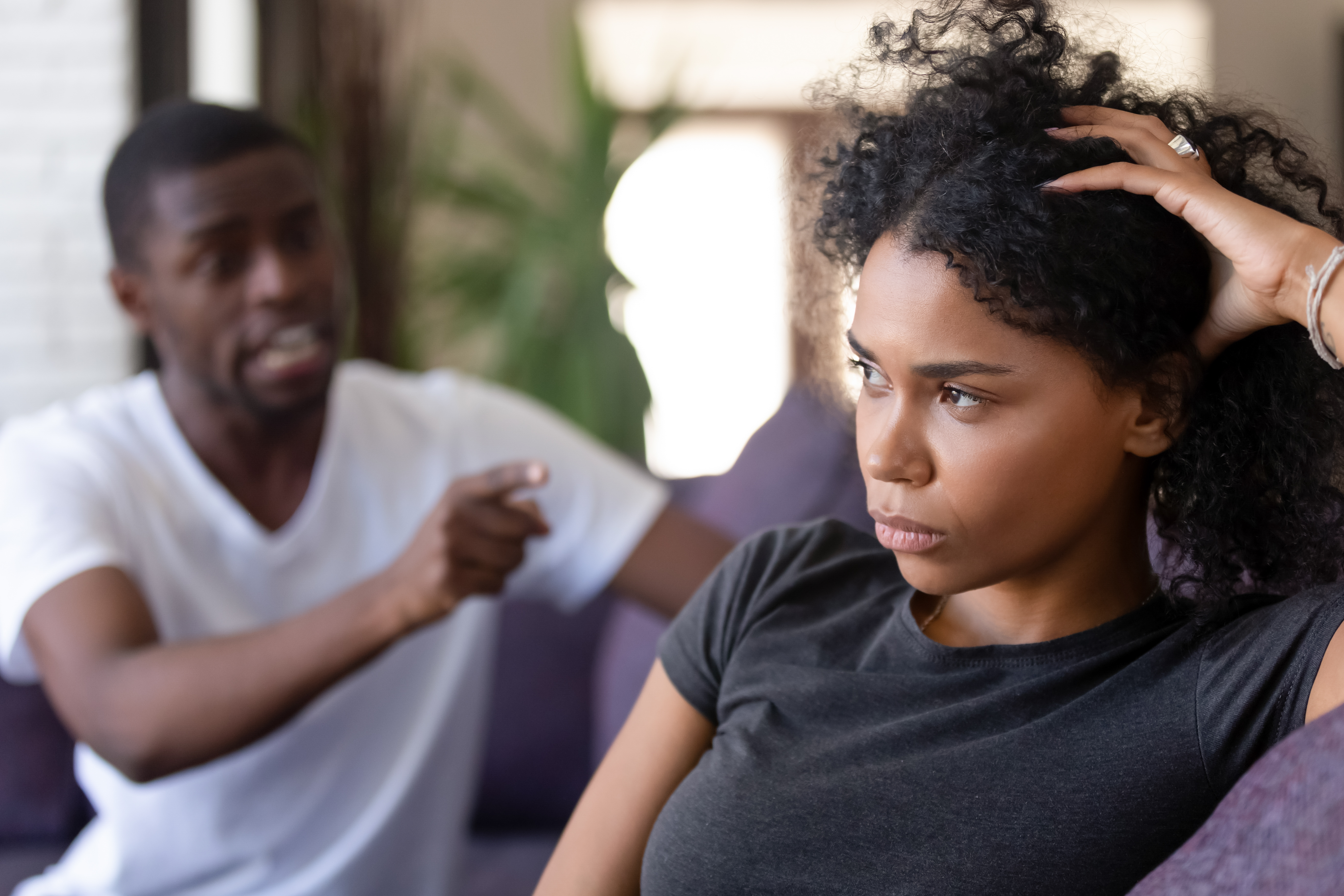 A man points his finger at a woman | Source: Shutterstock