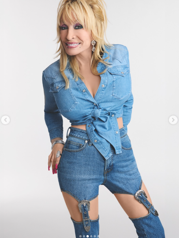 Dolly Parton models a denim outfit with a tied shirt and statement jeans | Source: Instagram/dollyparton