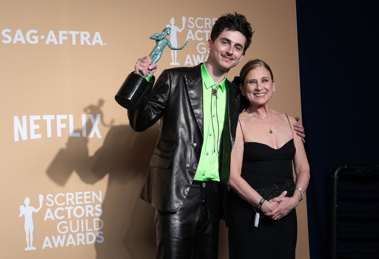 Timothée Chalamet and Nicole Flender posing together after he won the Outstanding Performance by a Male Actor in a Leading Role award for "A Complete Unknown" | Source: Getty Images