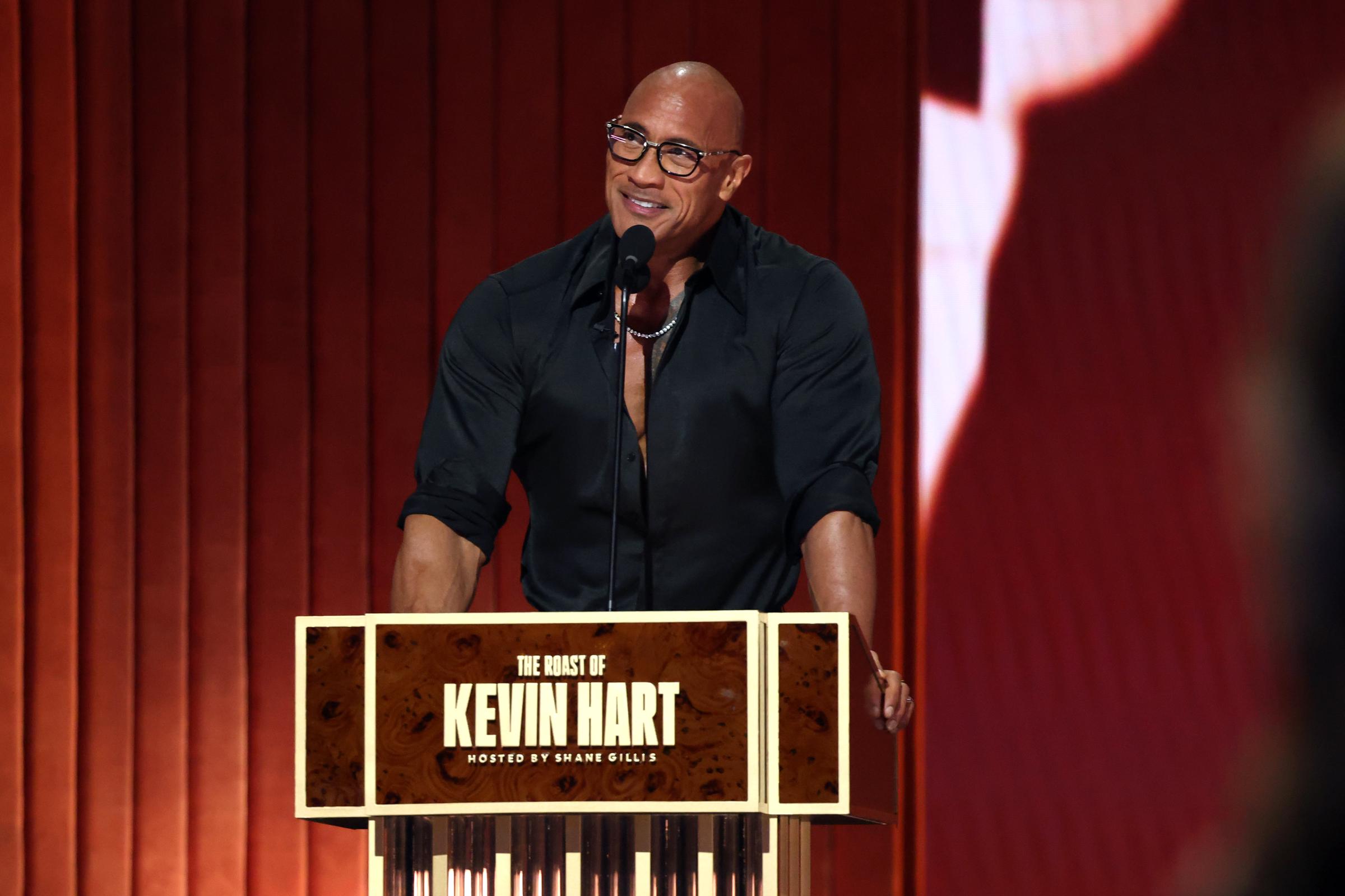 Dwayne Johnson speaks onstage during Netflix Is A Joke Festival Presents: The Roast of Kevin Hart at The Kia Forum on May 10, 2026, in Inglewood, California | Source: Getty Images