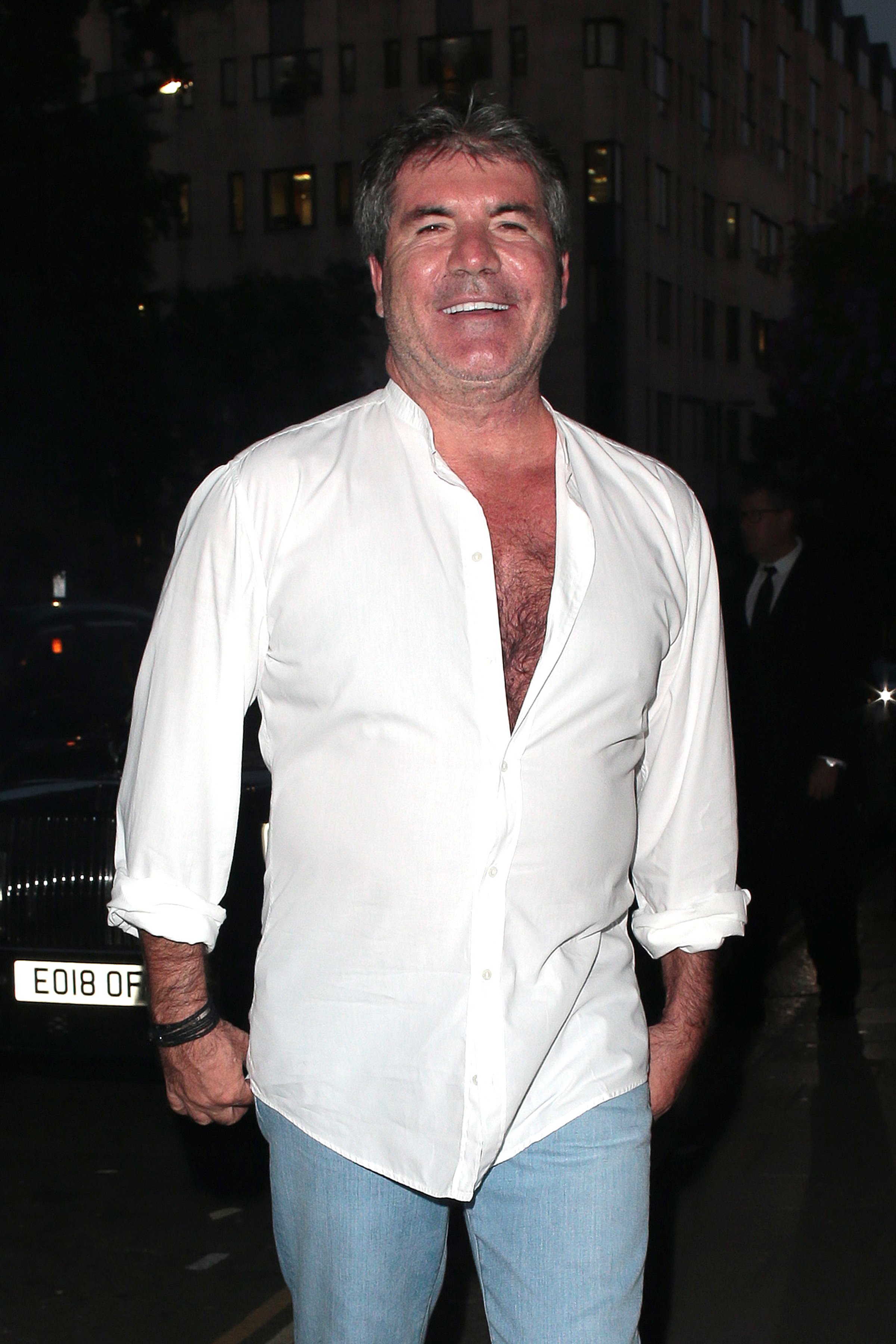 Simon Cowell on a night out leaving Annabel's on July 25, 2018, in London, England. | Source: Getty Images