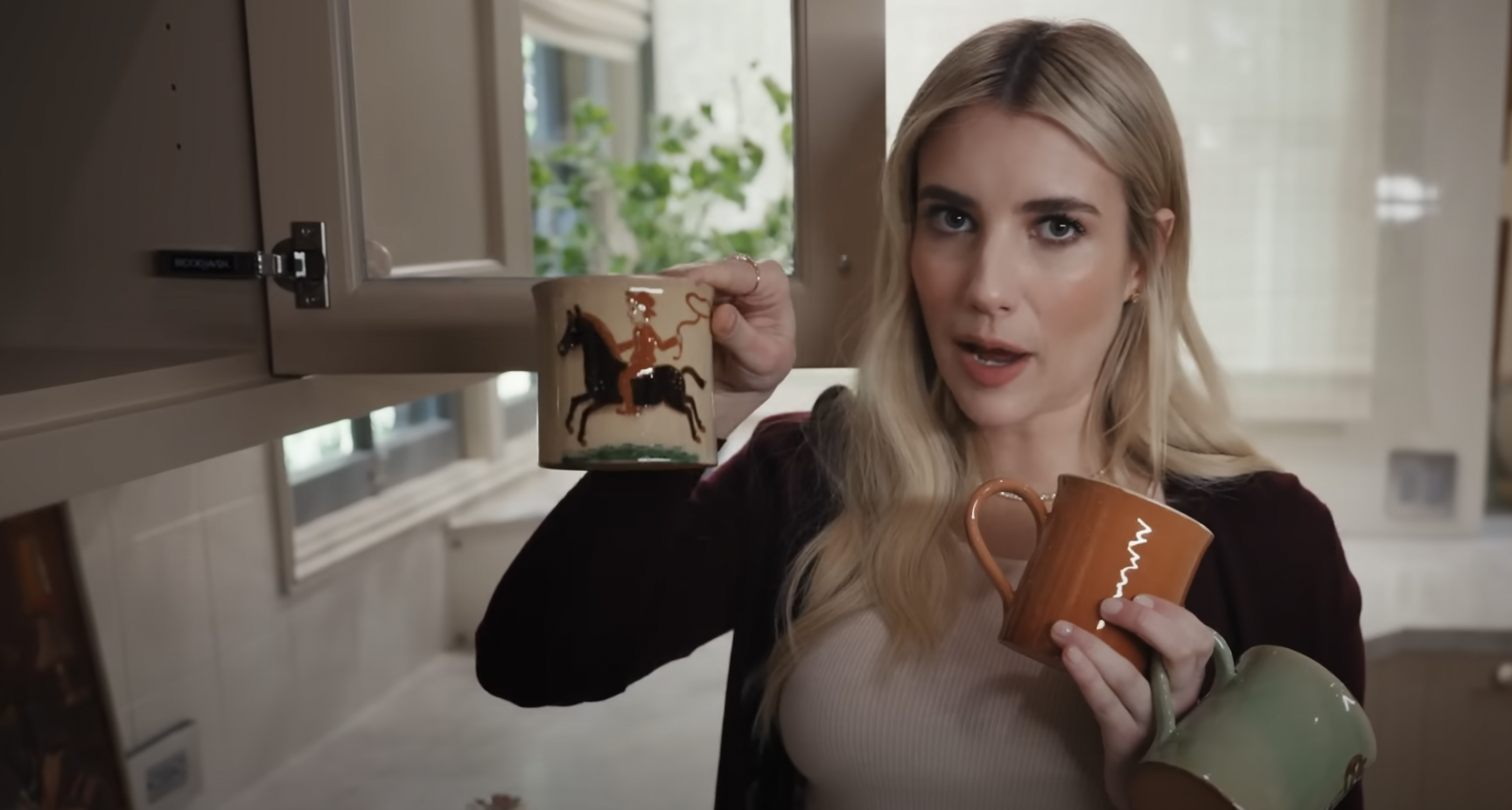 Emma Roberts' mug collection featured in Architectural Digest, dated April 2024 | Source: YouTube/Architectural Digest