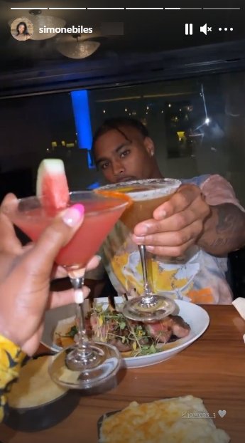 Screenshot of Simone Biles and Jonathan Owens having drinks in Miami. | Source: Instagram/simonebiles