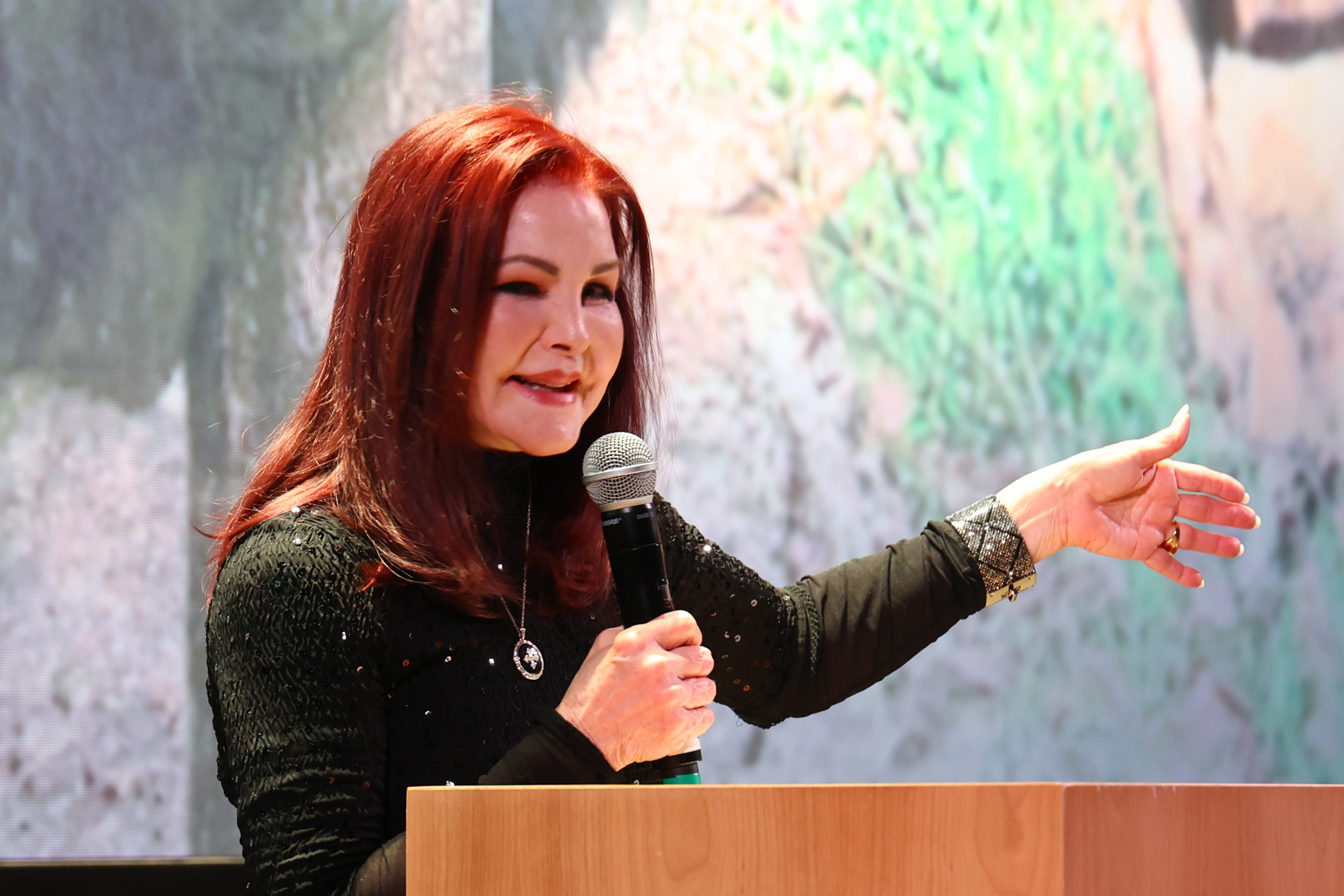 Priscilla Presley speaks onstage during the screening of American Humane Society's Documentary "Escape from Extinction: Rewilding" at Rivian Laguna on April 19, 2025, in California | Source: Getty Images