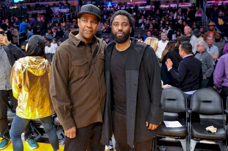 Denzel Washington and son John David Washington at a basketball game between the L.A Lakers and the San Antonio Spurs at Staples Center on December 05, 2018 in Los Angeles, California. | Photo by Allen Berezovsky/Getty Images
