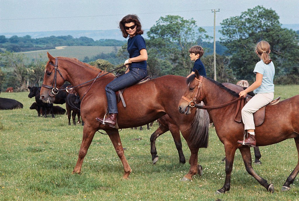 Jackie Kennedy accompanied by her children, Caroline and John. F. Kennedy Jr., in Ireland during a six-week holiday. | Source: Getty Images