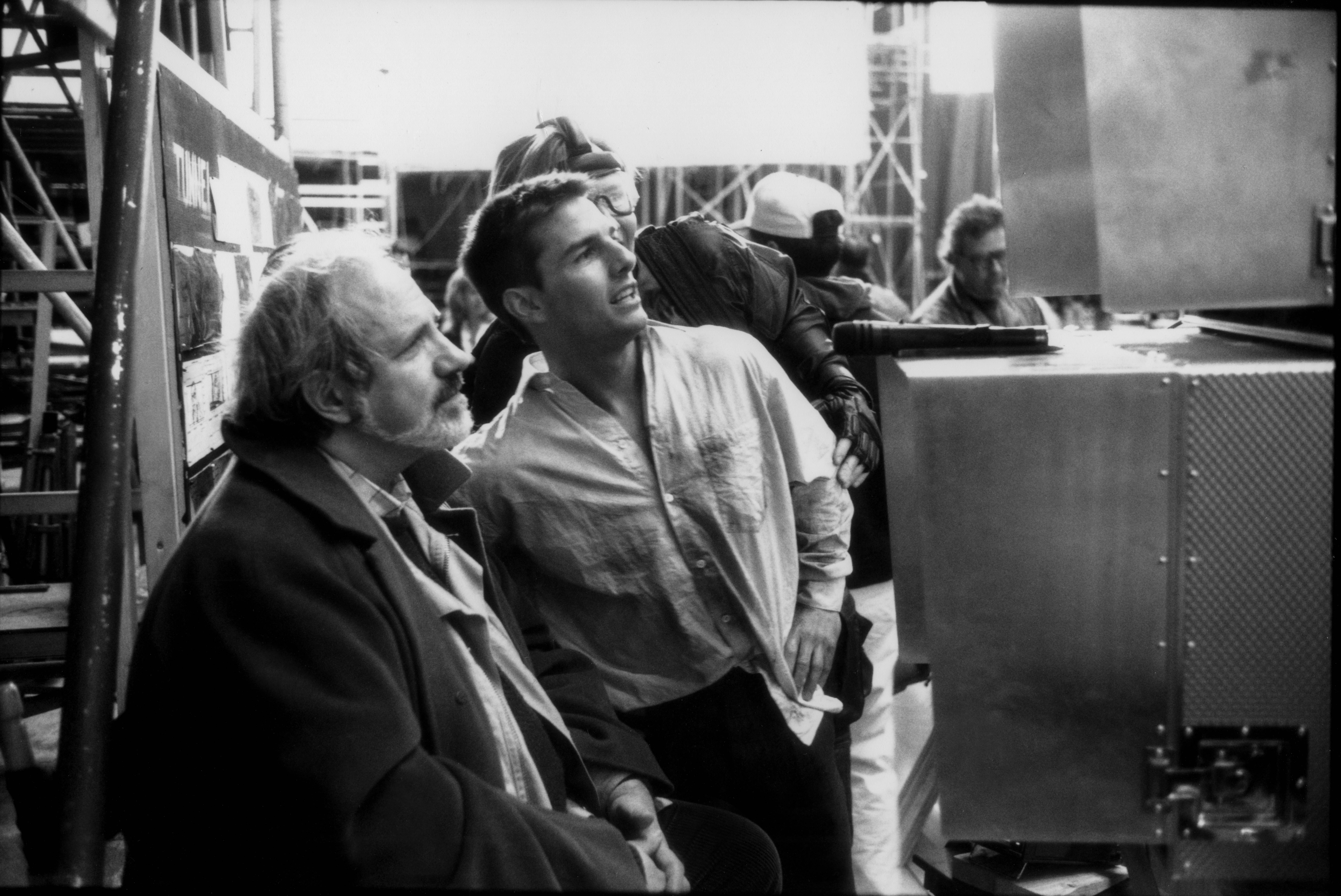 Brian De Palma and actor Tom Cruise on the set of "Mission: Impossible" in 1996 | Source: Getty Imagese