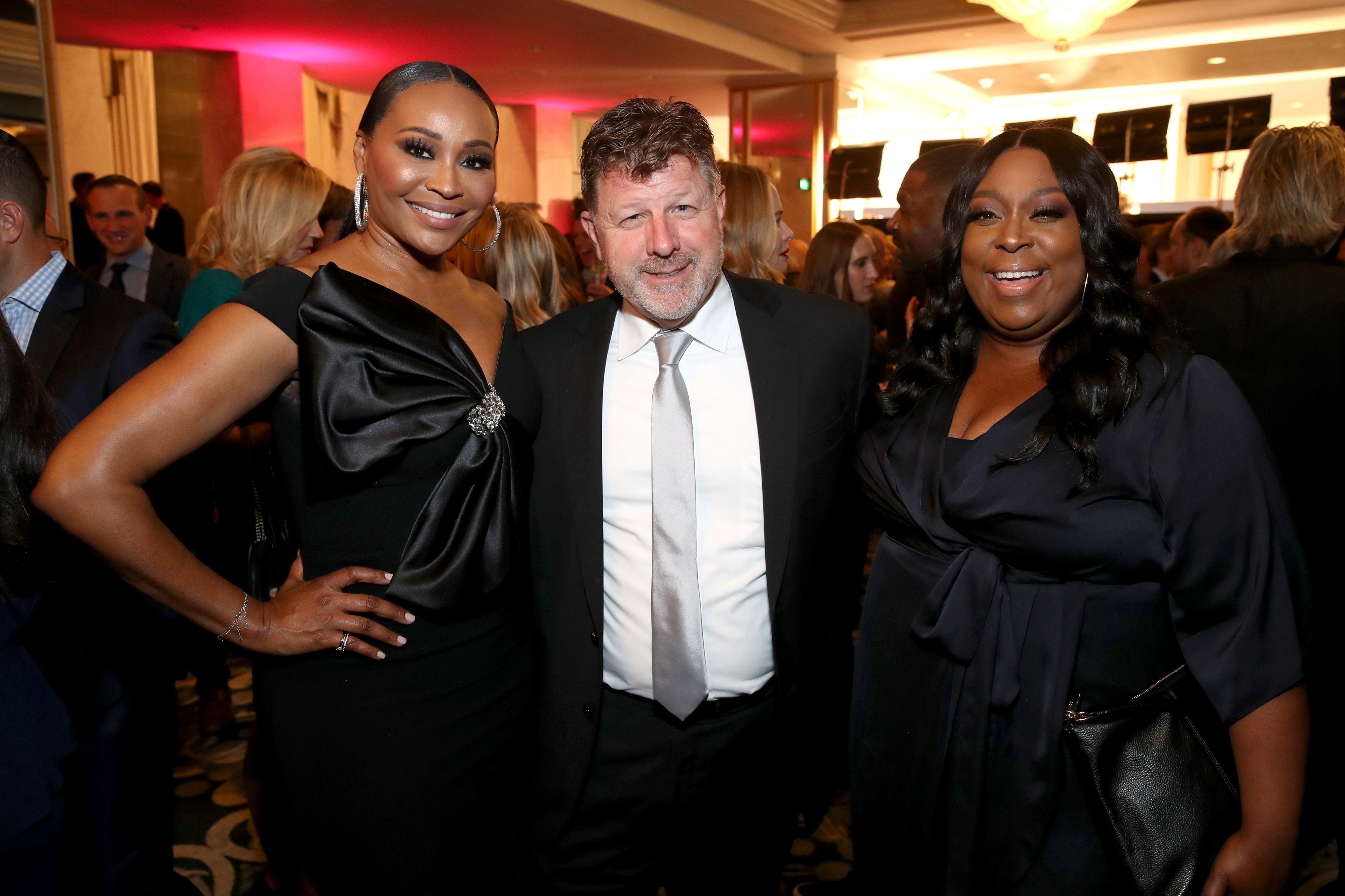 Cynthia Bailey, James Welsh, and Loni Love attend WCRF's "An Unforgettable Evening" at Beverly Wilshire, A Four Seasons Hotel on February 27, 2020 in Beverly Hills, California. | Source: Getty Images