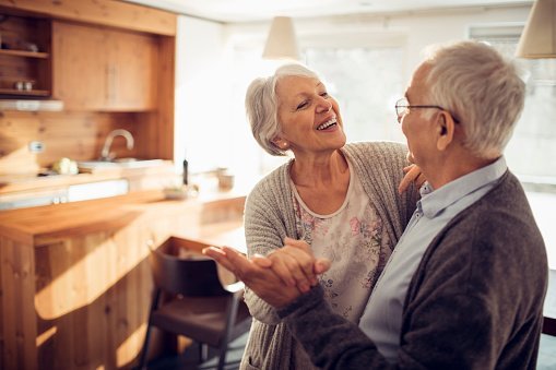 Two elderly people pictured having a dance | Photo: Getty Images