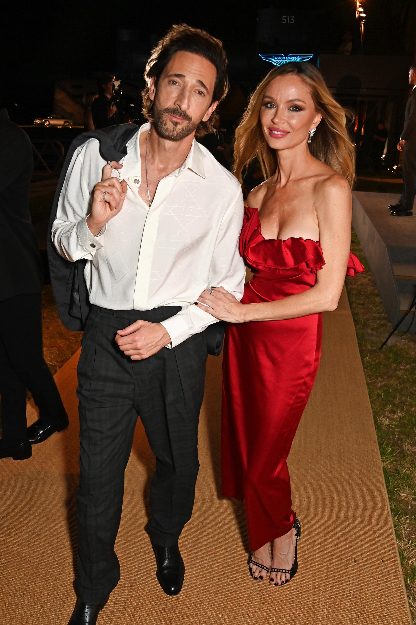 Adrien Brody and Georgina Chapman attend the launch of the new Aston Martin Vanquish on September 2, 2024, in Venice, Italy. | Source: Getty Images