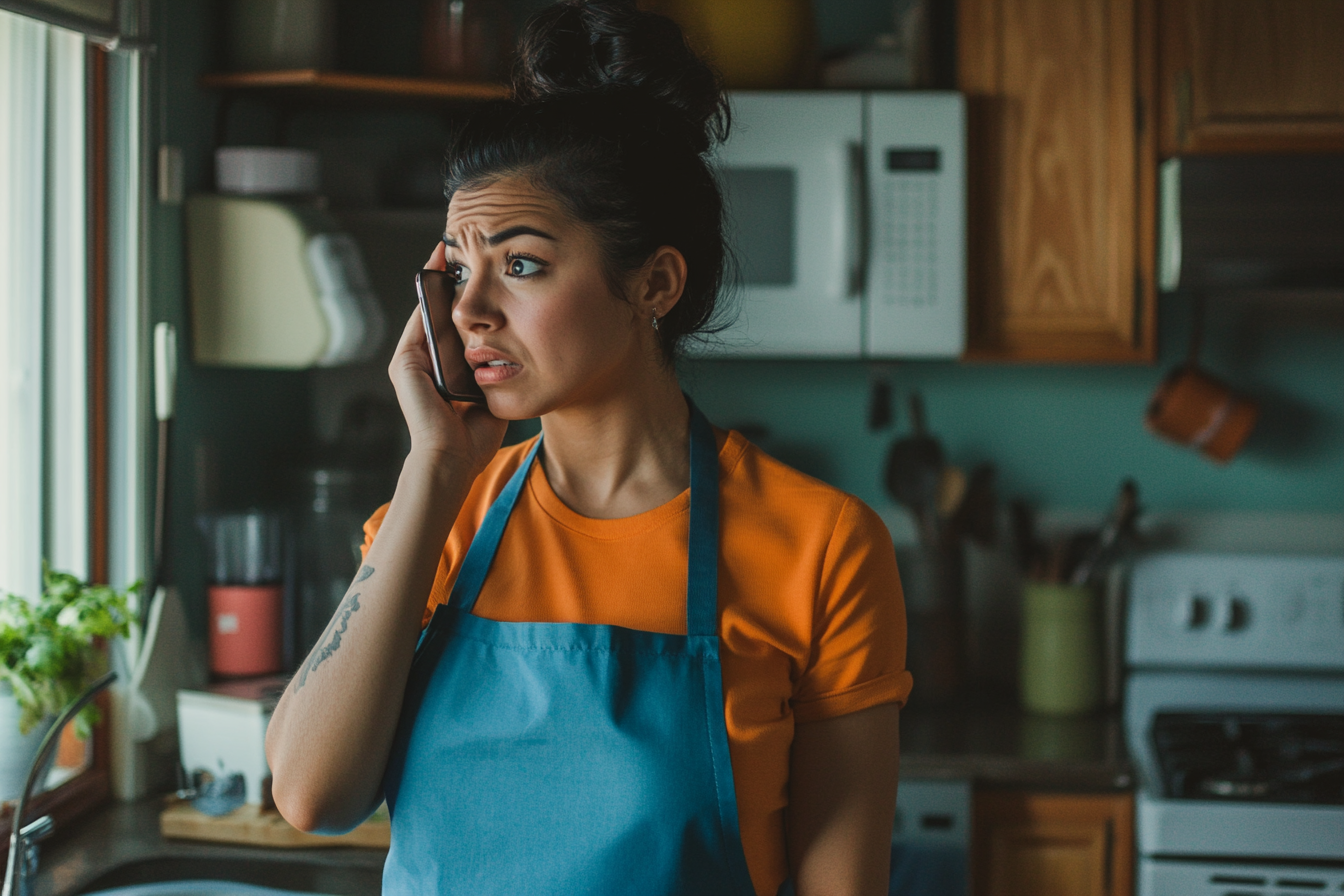 A worried woman on the phone | Source: Midjourney