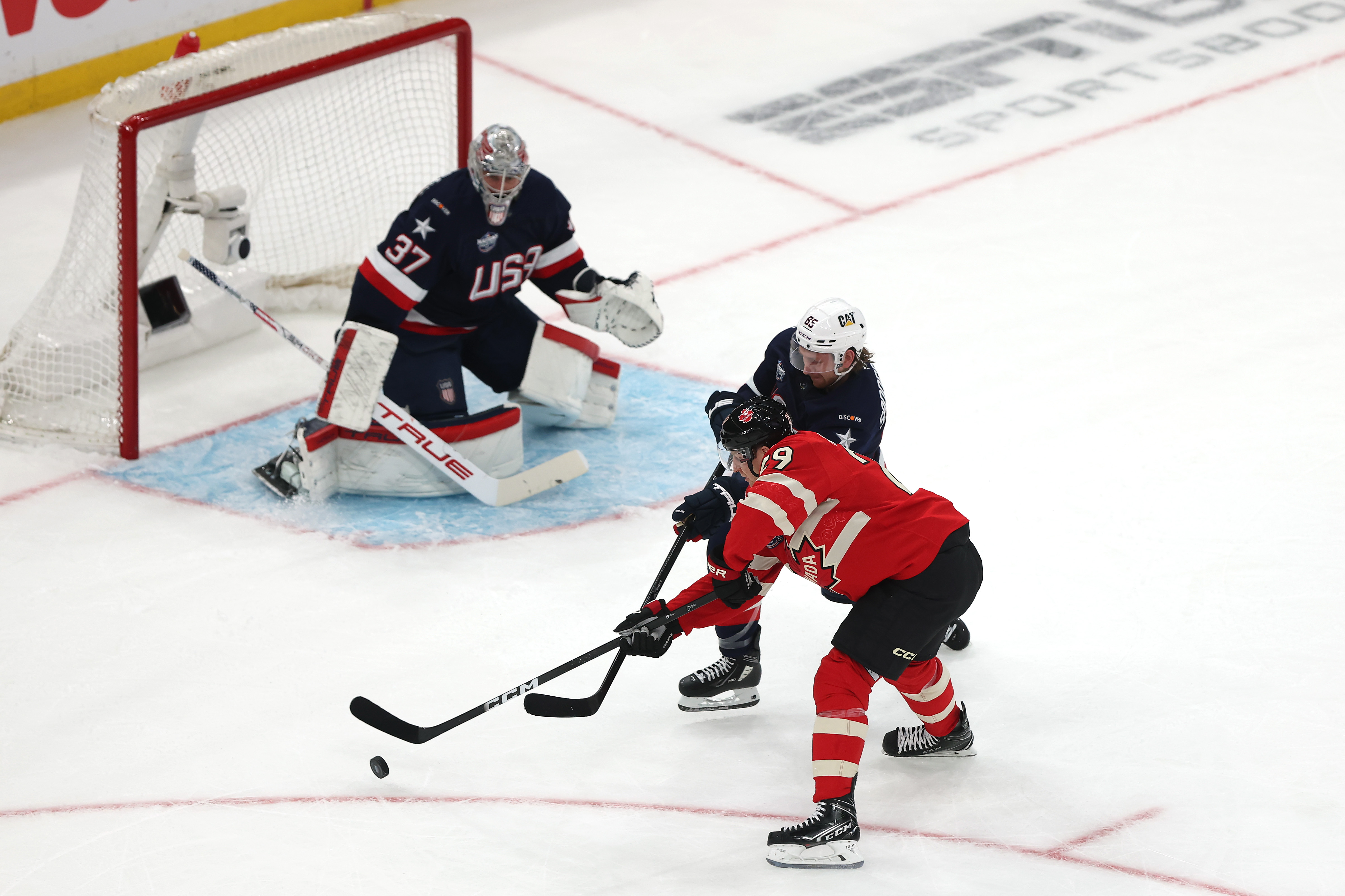 Nathan MacKinnon #29 of Team Canada controls the puck against Jake Sanderson #85 of Team United States during the first period on February 20, 2025 | Source: Getty Images