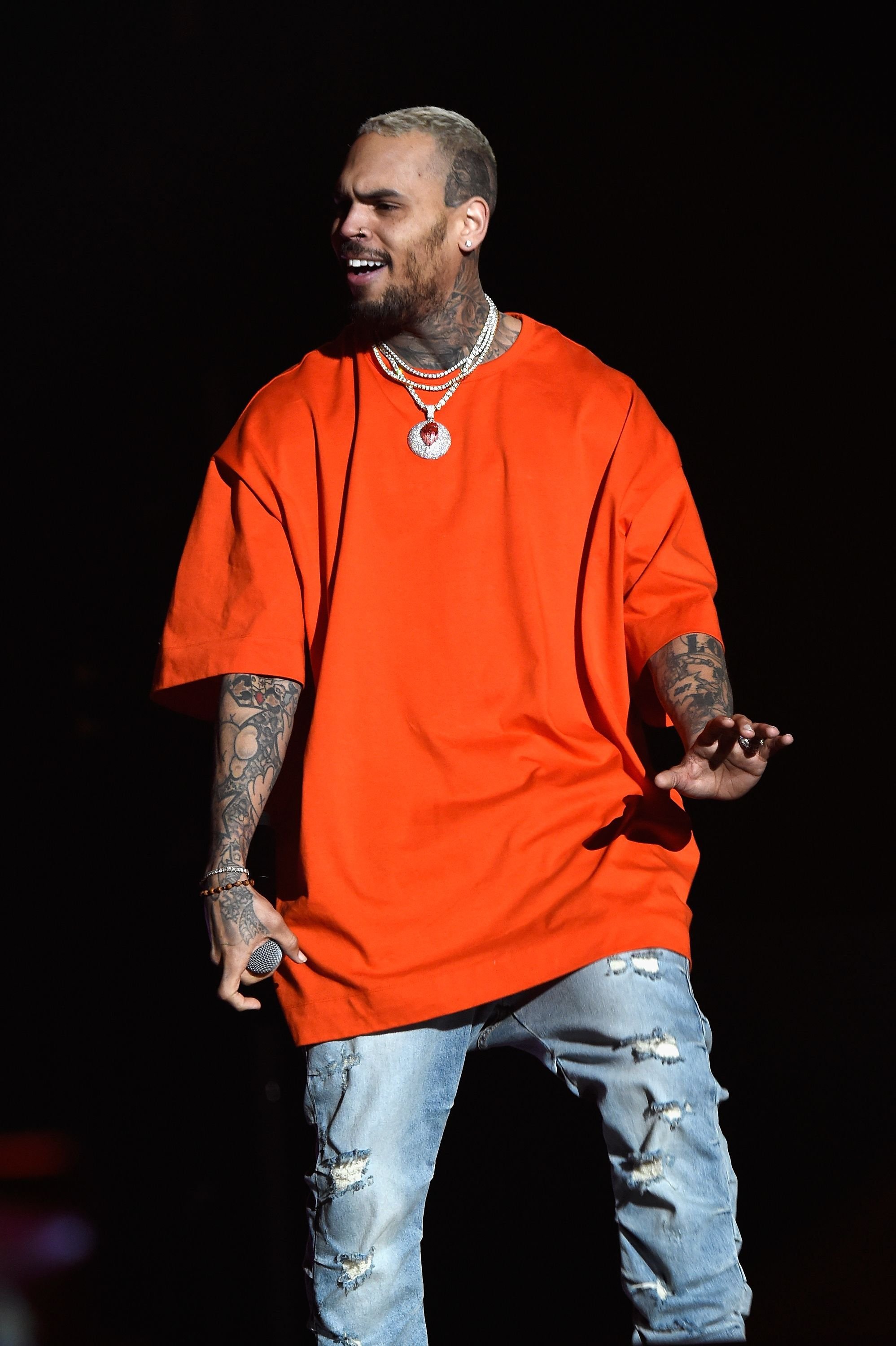 Chris Brown on stage at Demi Lovato's "Tell Me You Love Me" World Tour at The Forum on March 2, 2018. | Source: Getty Images
