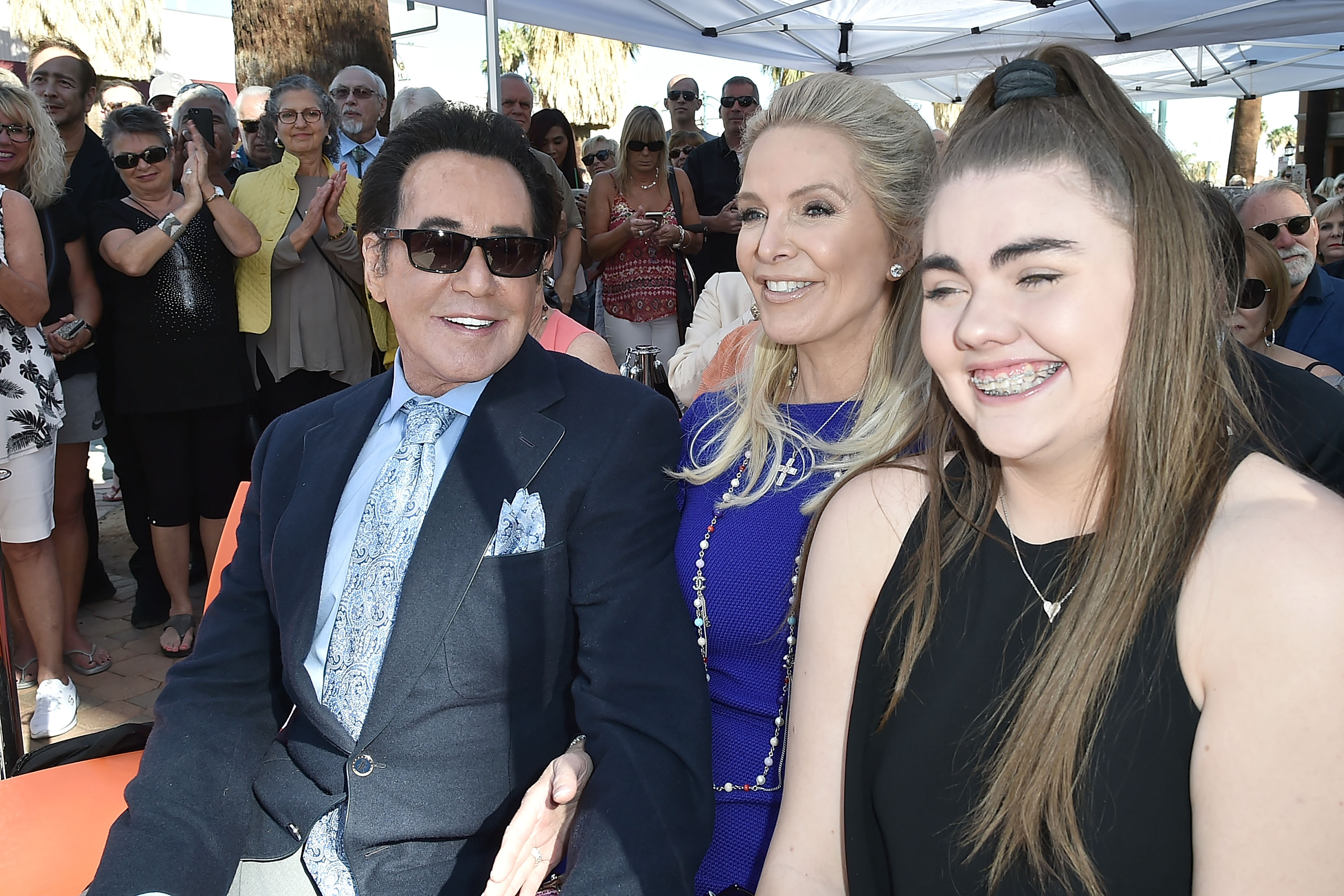 Wayne Newton, Lauren Newton, and Kathleen McCrone at the ceremony honoring Wayne Newton with a star on the Palm Springs Walk of Stars on November 9, 2018. | Source: Getty Images