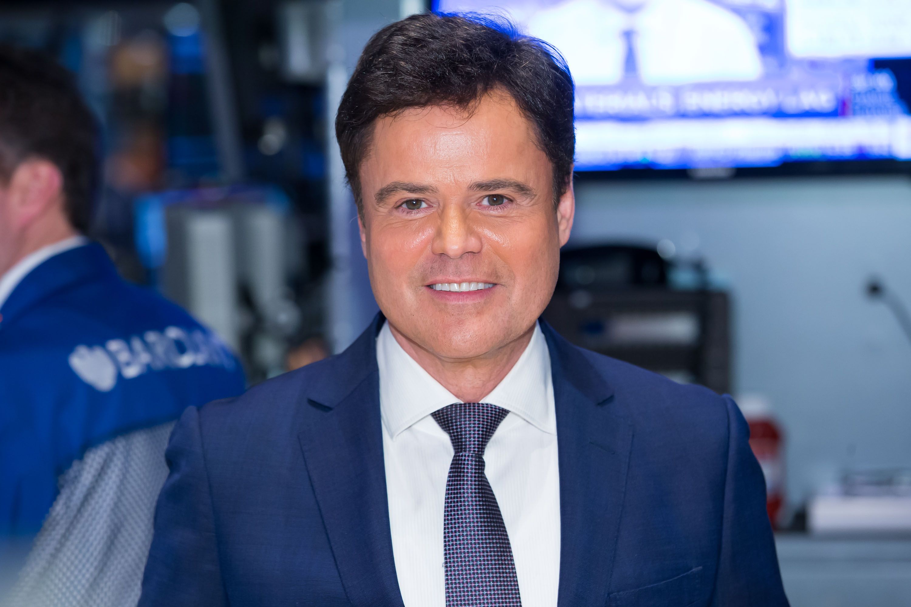 Donny Osmond rings the Closing Bell at New York Stock Exchange on January 13, 2015, in New York City | Photo: Ben Hider/Getty Images