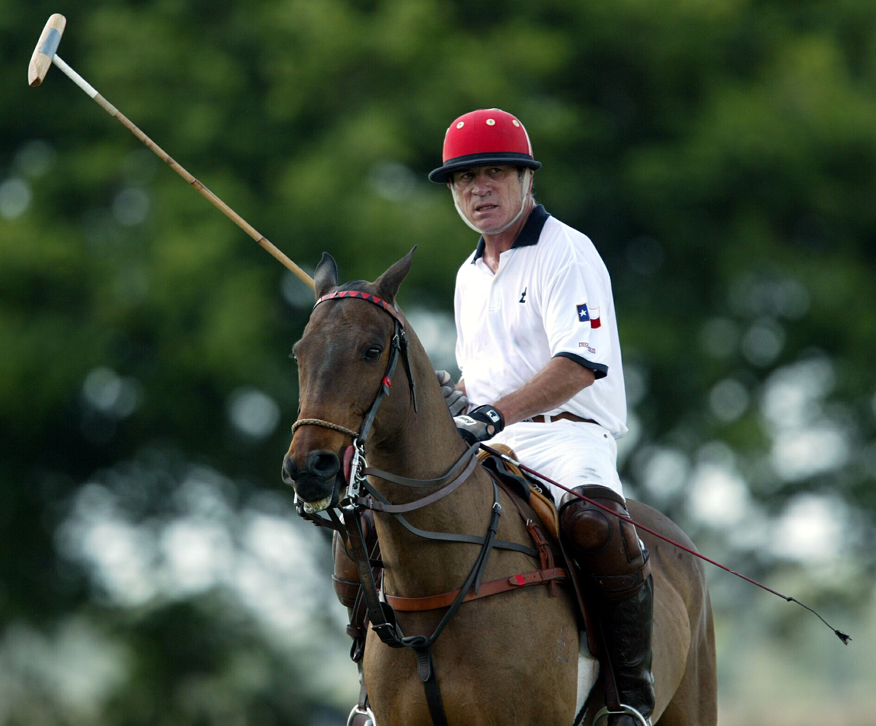 Tommy Lee Jones playing polo at the International Polo Club Palm Beach on February 6, 2004, in Wellington, Florida. | Source: Getty Images