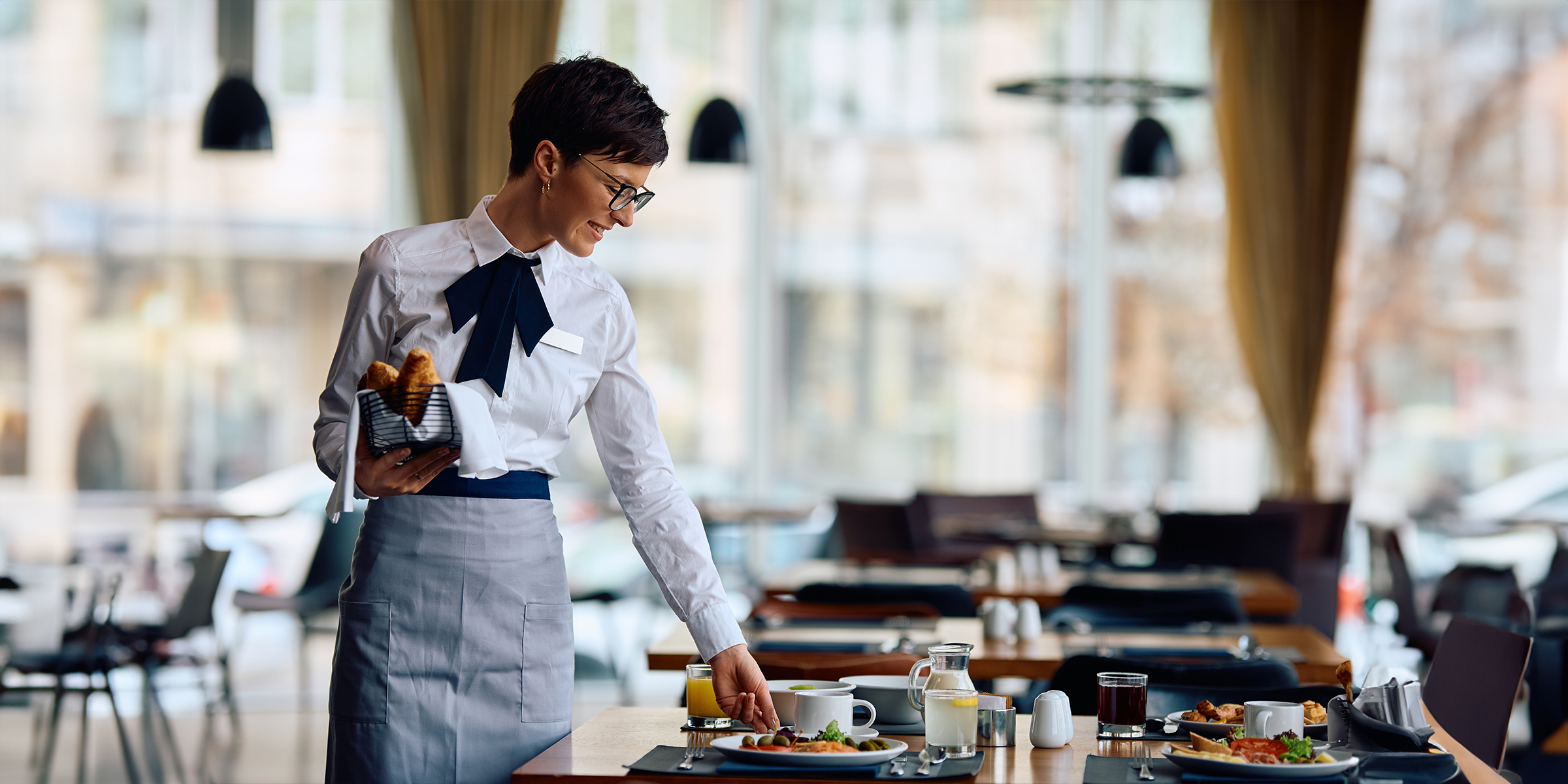 A waitress in a restaurant | Source: Shutterstock