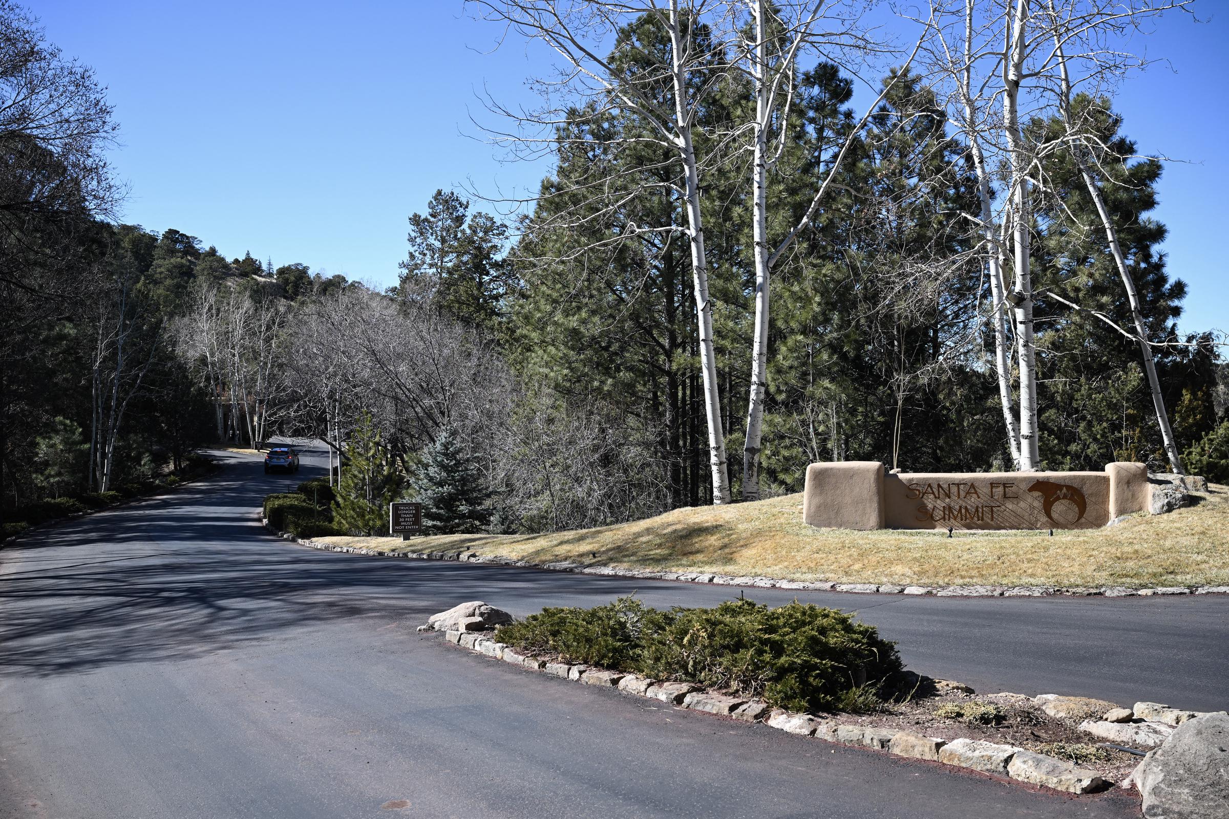 A general view of the entrance to the Santa Fe Summit neighborhood where late US actor Gene Hackman lived, in Santa Fe, New Mexico, on February 28, 2025 | Source: Getty Images