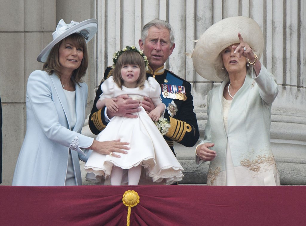 Carole Middleton, Prince Charles, and Camilla Parker-Bowles holding Eliza Lopes on April 29, 2011. | Photo: Getty Images