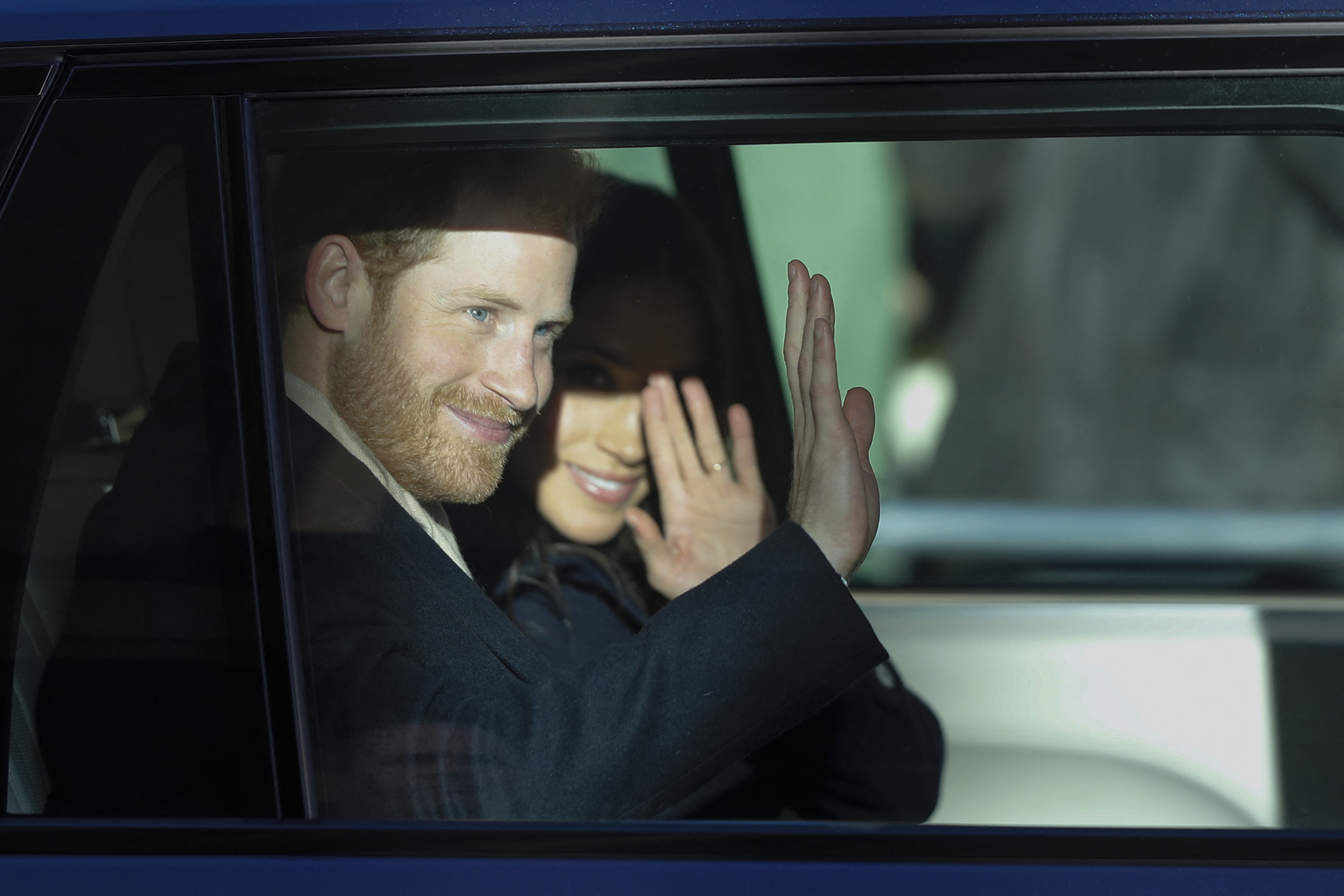 Prince Harry and Meghan Markle departing from the Terrence Higgins Trust World AIDS Day charity fair on December 1, 2017. | Source: Getty Images