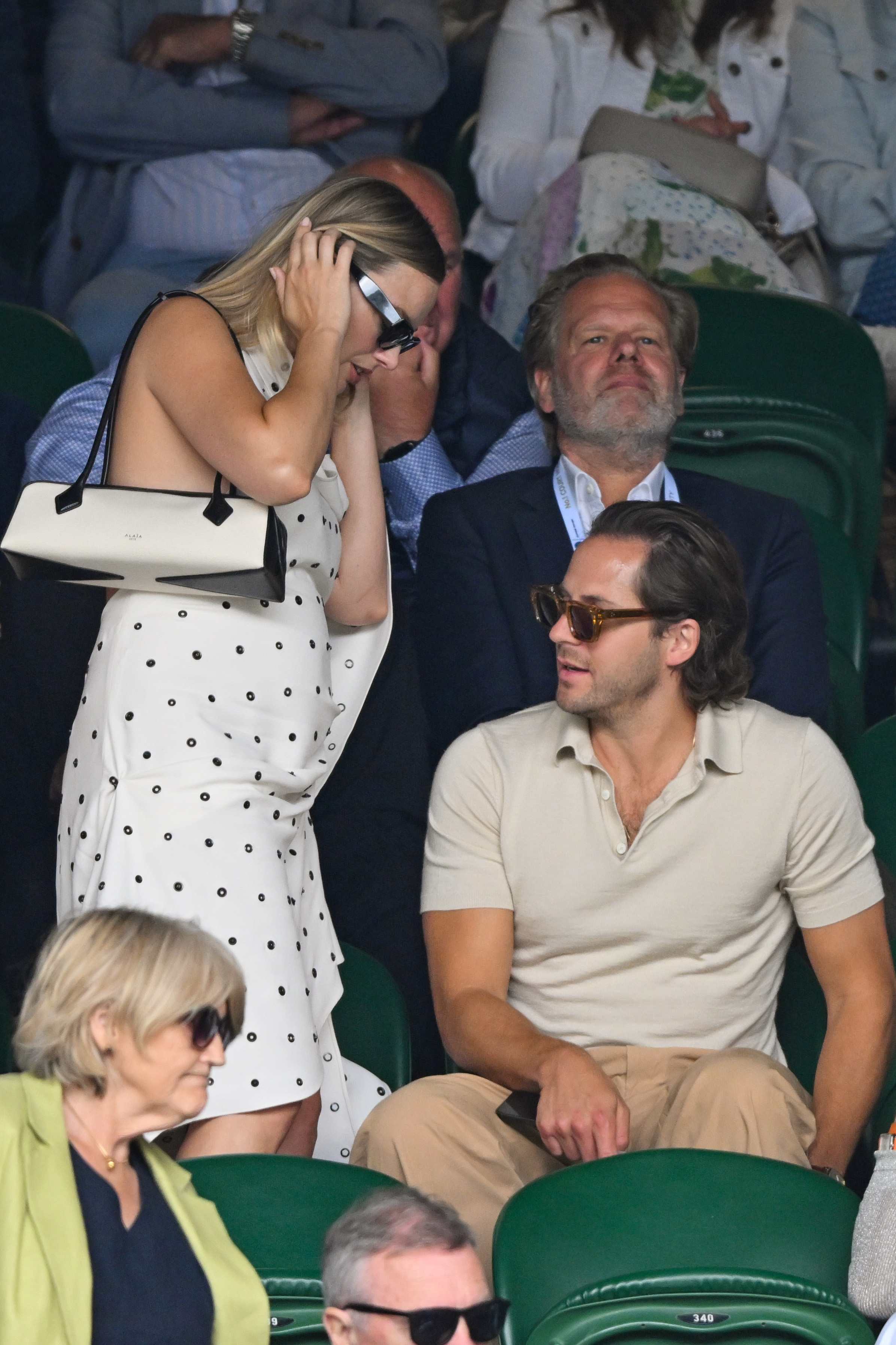 Margot Robbie and Tom Ackerley at the All England Lawn Tennis and Croquet Club on July 12, 2024, in London, England. | Source: Getty Images