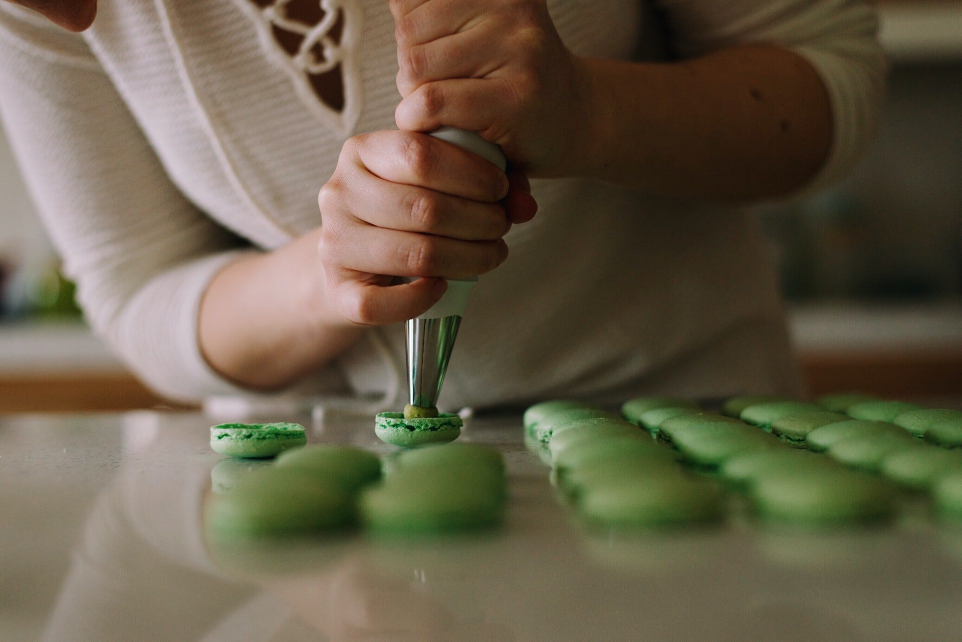 A woman making macaroons | Source: Unsplash